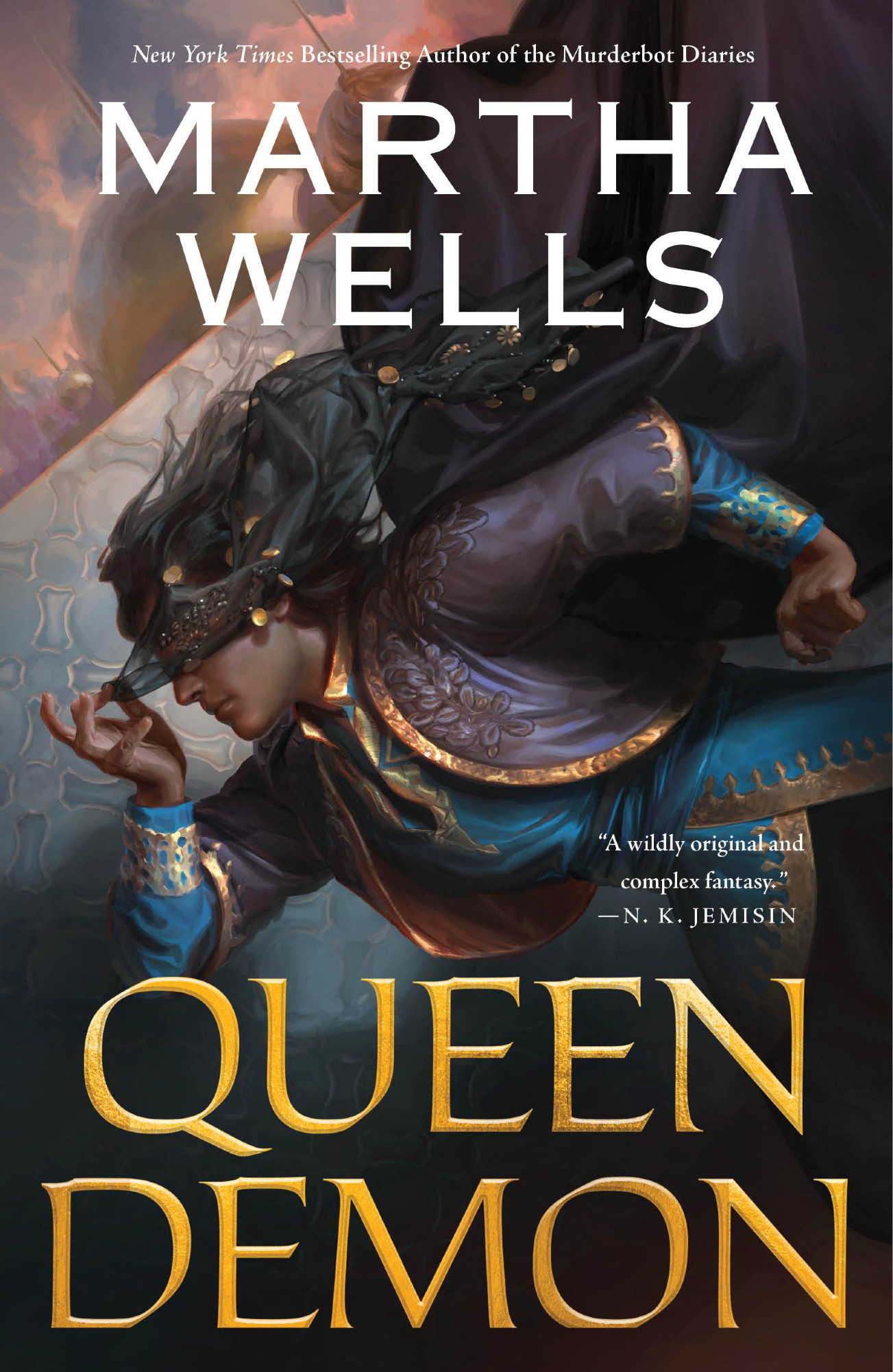 The cover of Queen Demon, with Kai leaping or running down toward the lefthand side of the art. He's dressed in blue, purple, and gold, a dark veil slightly tugged over his eyes, hair and veil and purple coat streaming behind him.