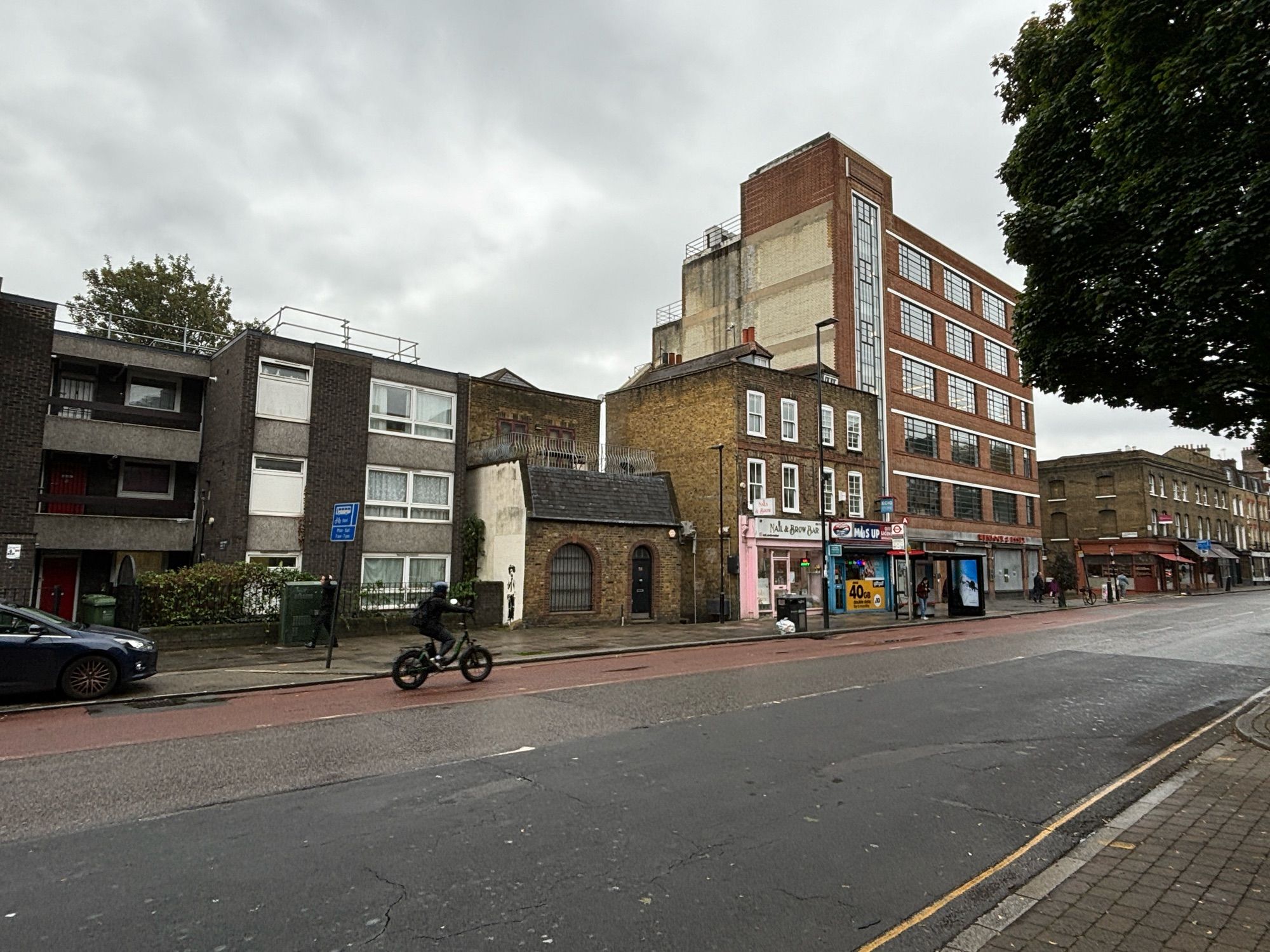 Half a minute from the posh elegance of million-dollar terraces: ex council housing, commercial, and plain weird.