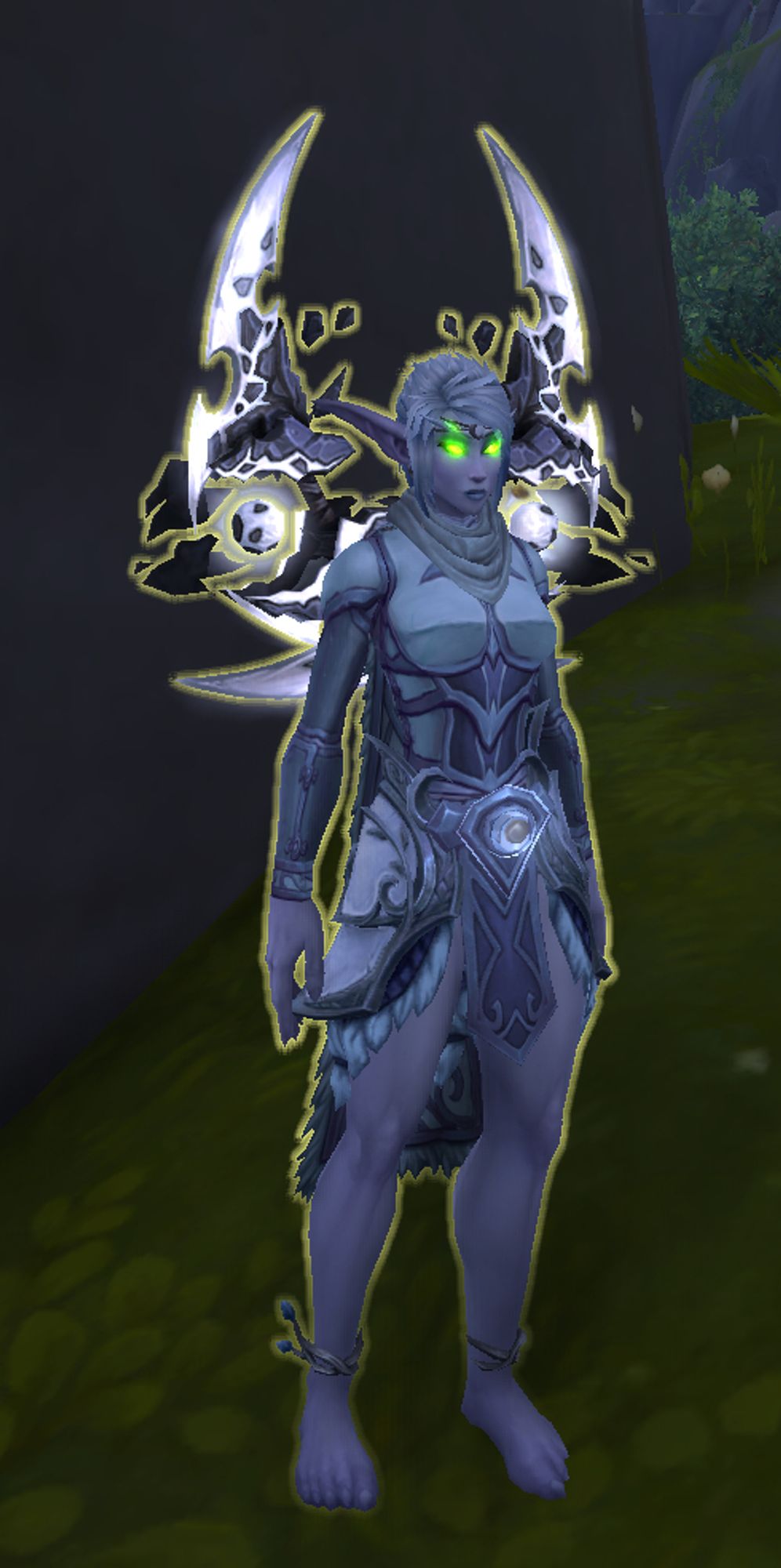 a partial screenshot from world of warcraft: a female night elf demon hunter wearing all white, white skin, white hair, white-bladed warglaives. the only color is the fel green coming from her eyes.