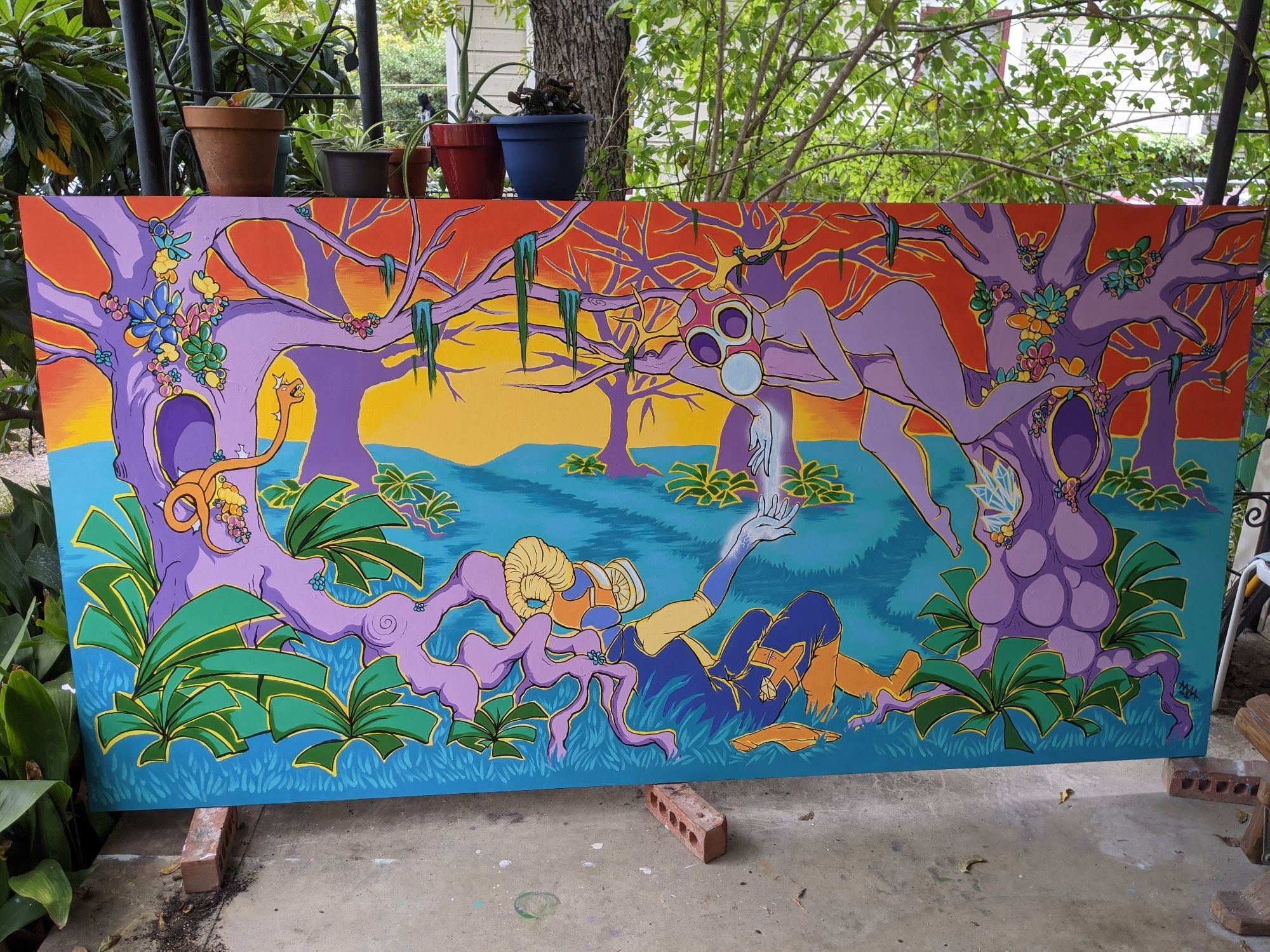 8'x4' board resting on bricks, featuring a mural of two figures in a toxic forest