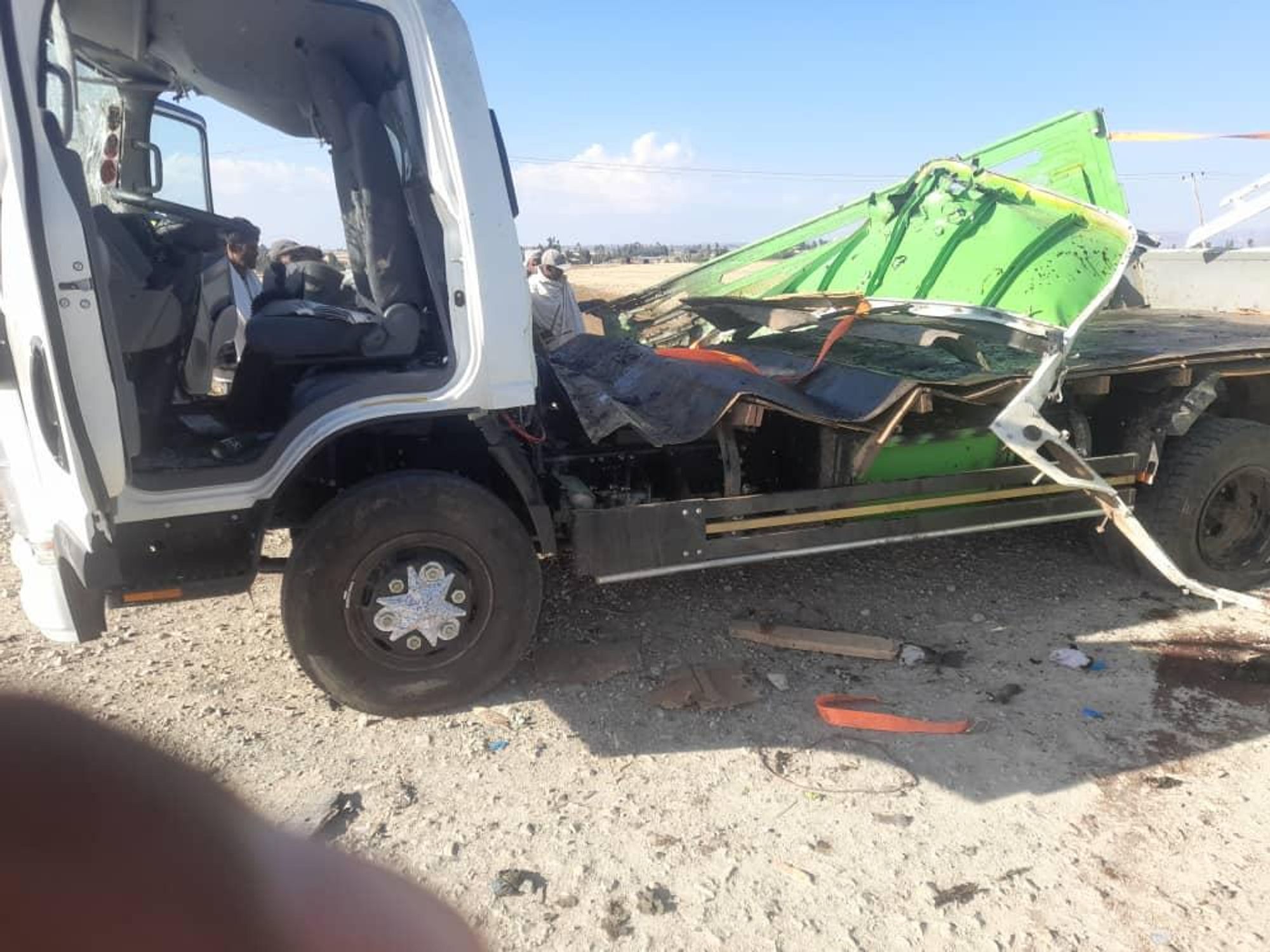 A white cab truck, with its trailer obliterated after it was hit by a drone strike in Ethiopia.