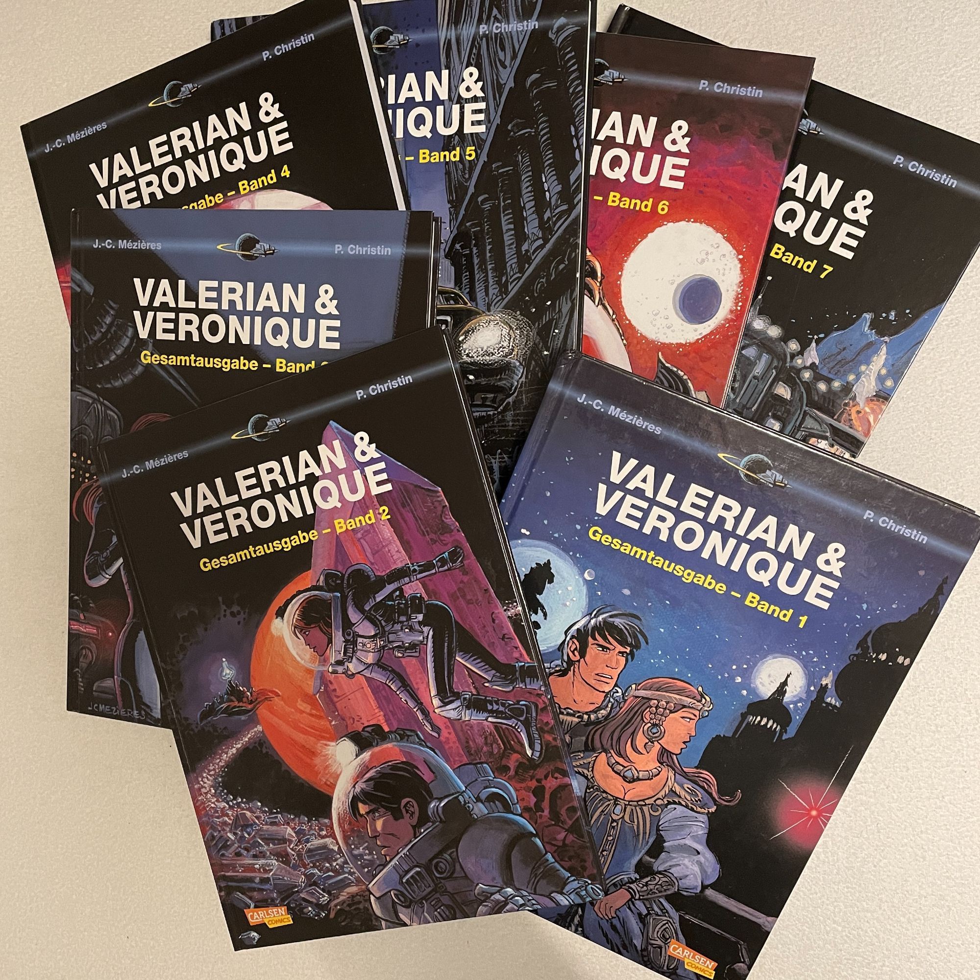 Titelbilder von sieben Sammelbänden der "Valerian & Veronique" - Gesamtausgabe.