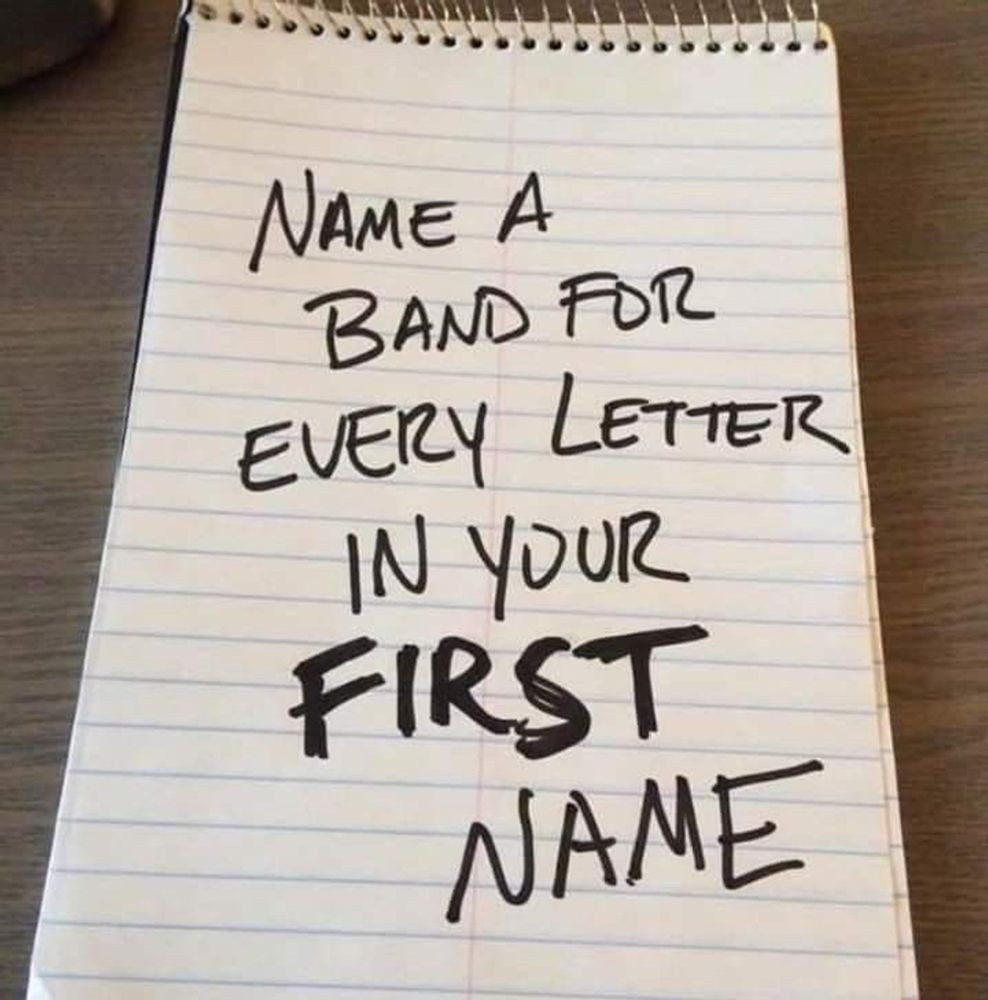 Notepad, on which is written: Name a Band for Every Letter in Your First Name