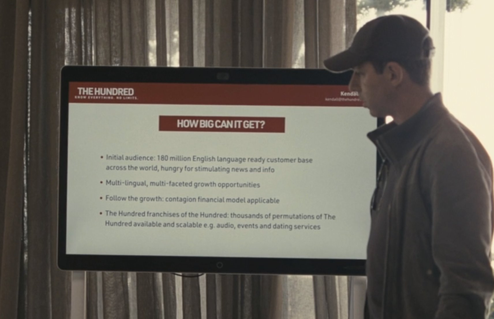 succession failson looking at an mba-madlibs pptx deck for his stupid media company "the hundred"