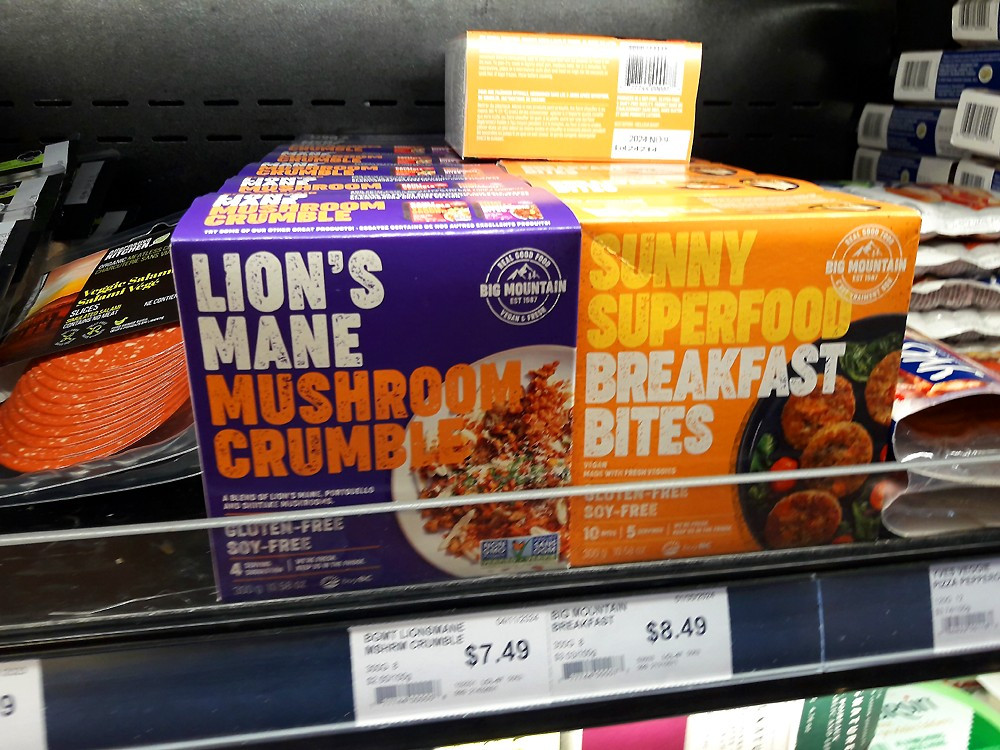 This shows two vegan products side by side. The first is Lion's Mane Mushroom Crumbles - a mixture of Lions Mane, Portabello and Shitake mushrooms that you sprinkle over your food for added something. The second box is Superfood Breakfast Bites - a vegan concoction of veggies made to look like breakfast sausage rounds - gluten & soy free of course. The added bonus is that the breakfast bites are taste and texture free as well offering the benefits of ultra-processed plant food. Yum. All yours for $8.49.