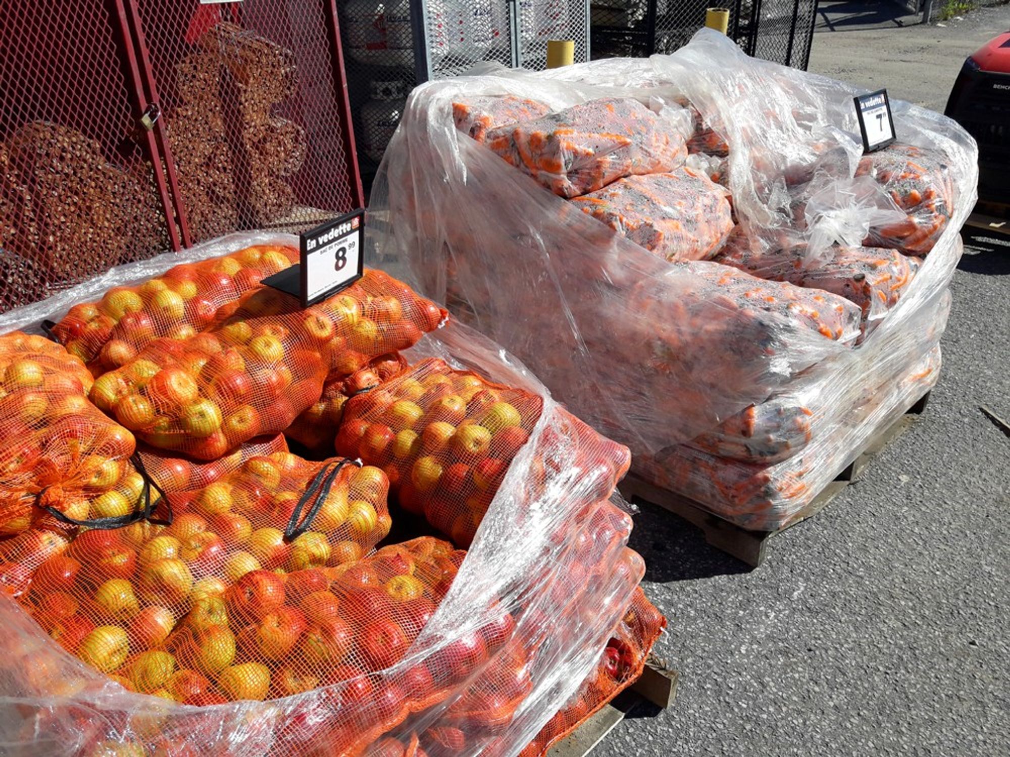 Pallets of bags of bruised apples, unfit for human consumption, selling for $8.99 to feed the deer.