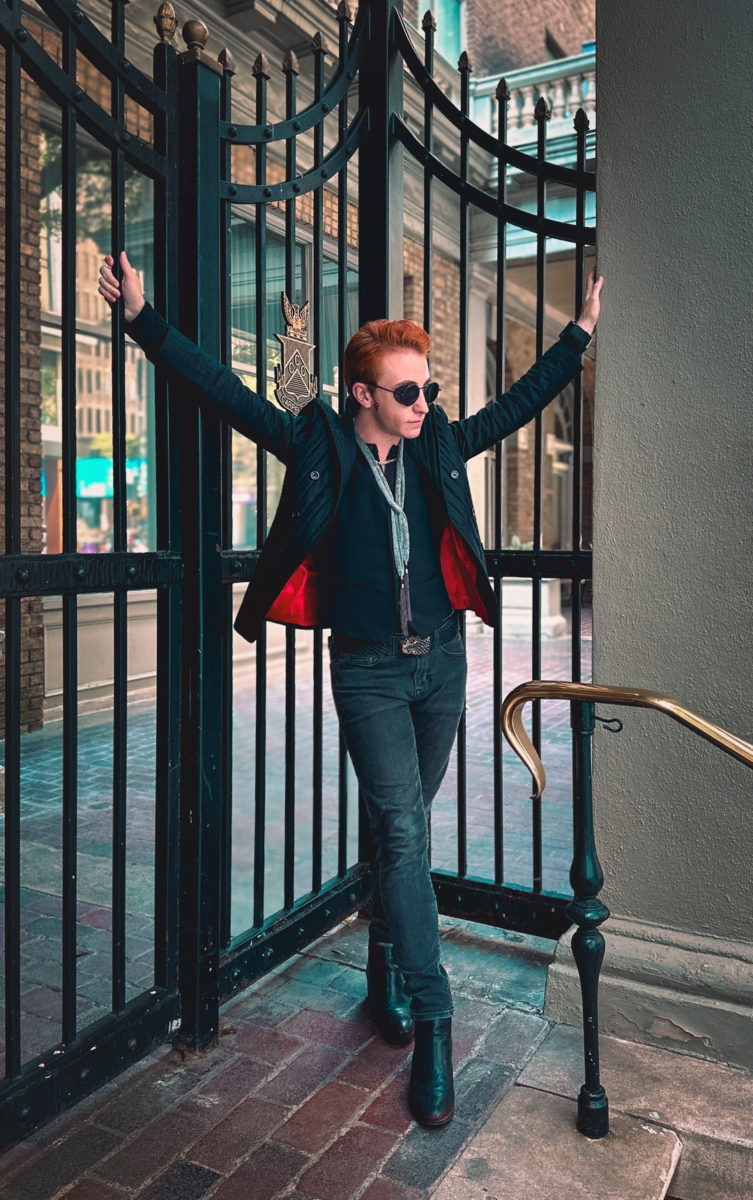 OP dressed as Crowley from Good Omens in a standing pose that can only be described as “serving cunt”