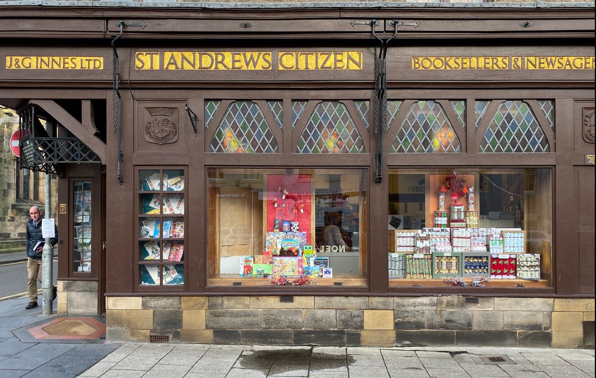 detail of shopfront of J & G Innes' on South Street. It was late November 2022  when I took the photo and there is a display of Christmas crackers in the right-hand window.