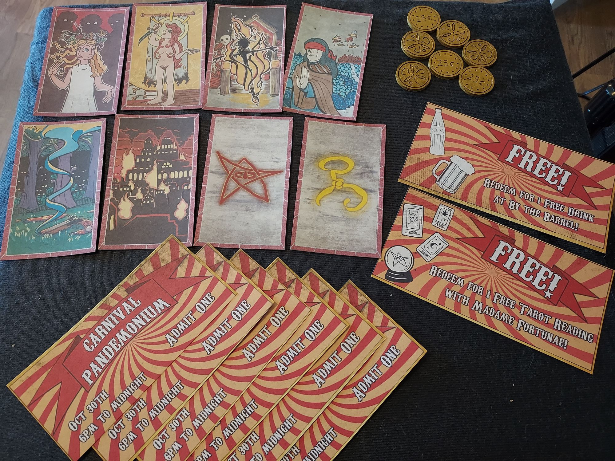 A photo of several props for a Call of Cthulhu scenario, including 8 custom tarot card-style designs (including a Yellow Sign and the Elder Sign), carnival tickets, 3D printed "gold" coins marked 25c on one side and with the Yellow Sign on the other, a coupon for a free drink, and a coupon for a free tarot reading