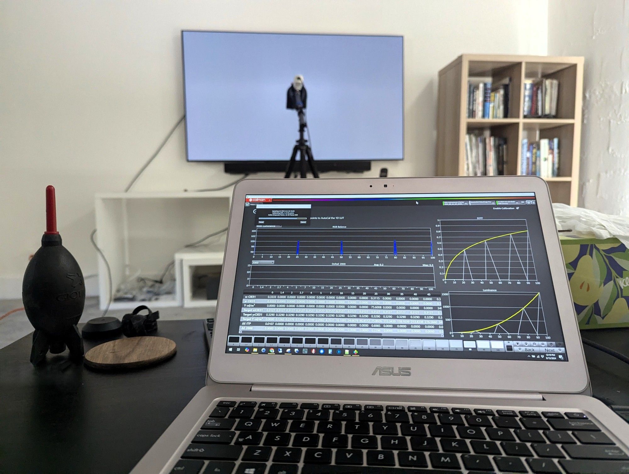 Laptop running Calman display calibration software connected to an LG G4 OLED television