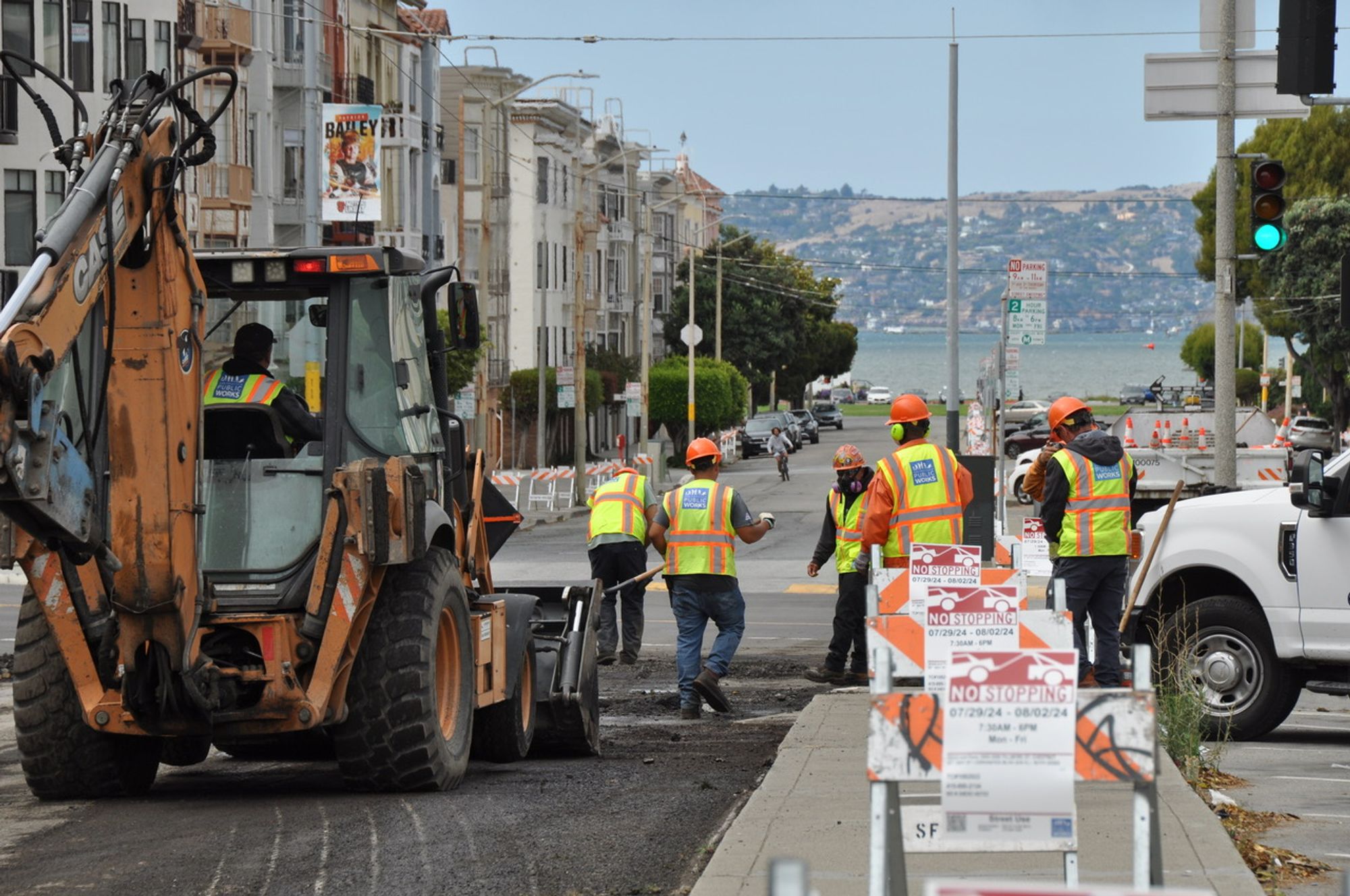 Public Works’ street repair crews grind the Fillmore Street roadway before applying a layer of fresh asphalt.