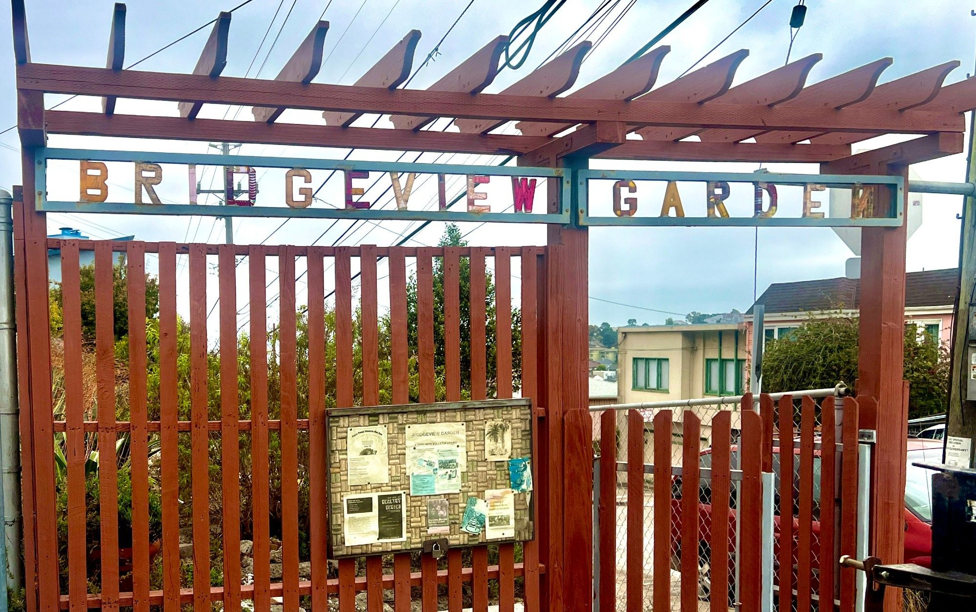 The pergola gate at the entrance of Bridgeview Garden in the Bayview.