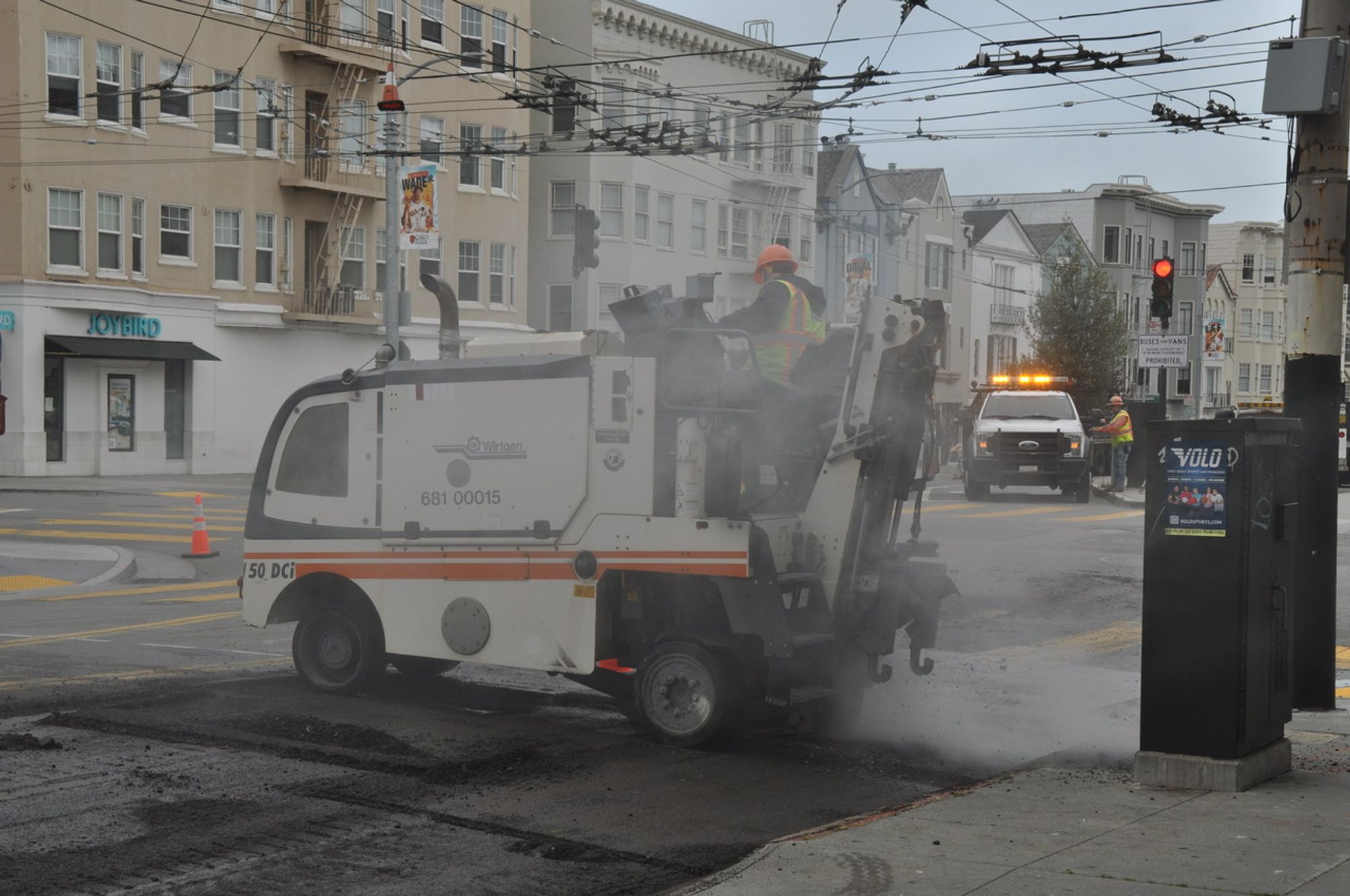 Fillmore Street in the Marina gets paved with asphalt for a smoother surface.