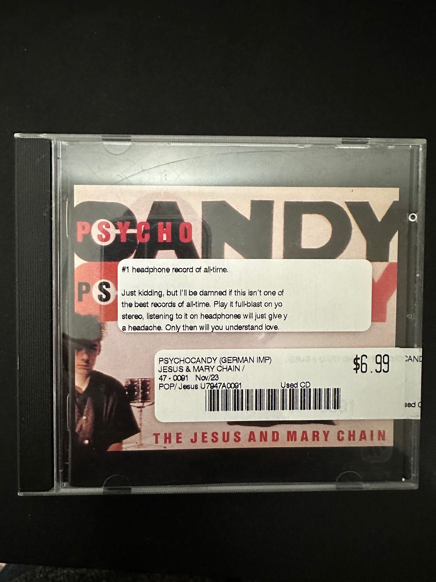 Jesus and Mary Chain - Psycho Candy CD. Label warning: “#1 headphone record of all time. Just kidding, but l'll be damned if this isn't one of the best records of all-time. Play it full-blast on yo stereo, listening to it on headphones will just give y a headache, Only then will you understand love”