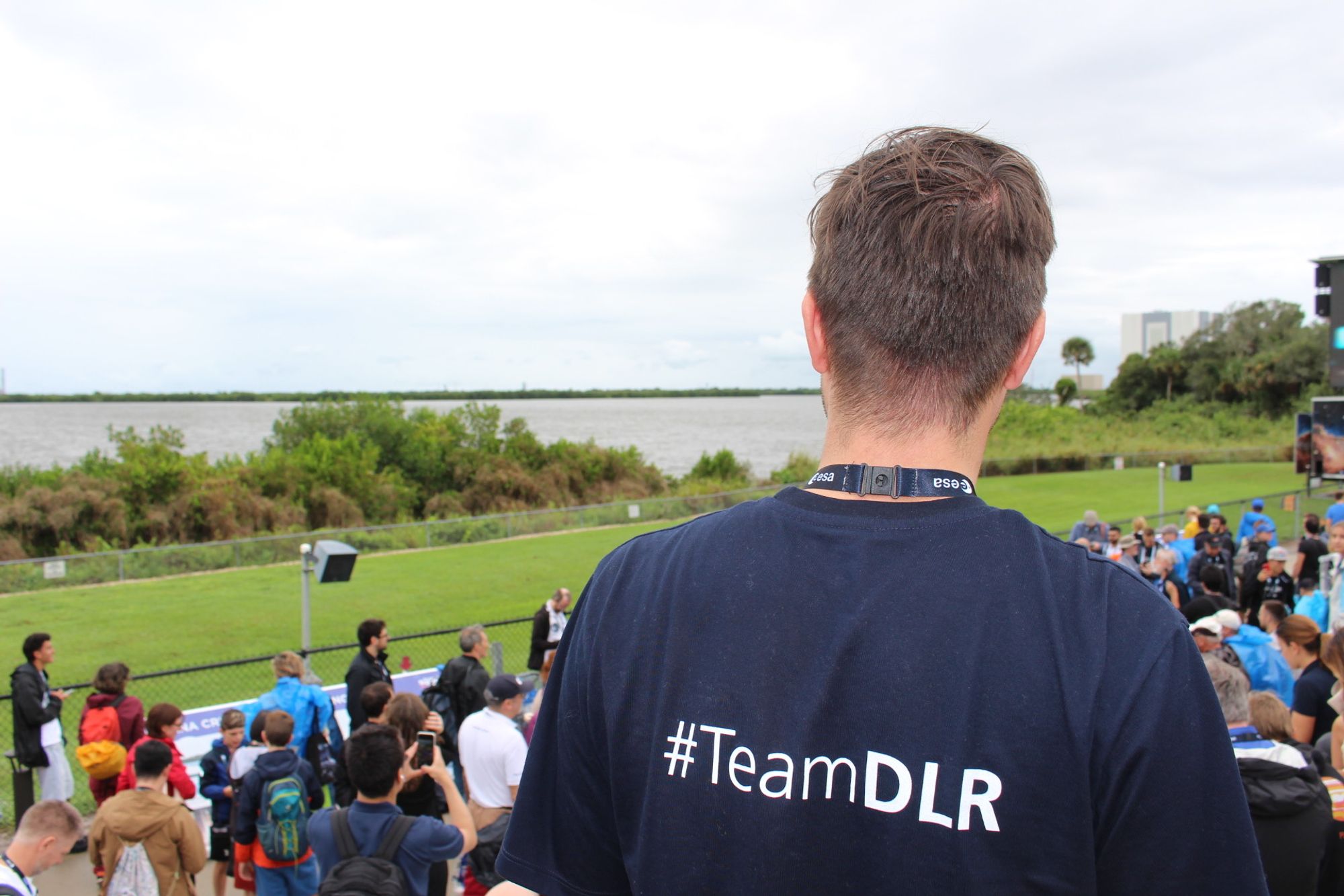 Men with Shirt "#TeamDLR" watching the launch site of Hera Spacecraft at Cape Canaveral