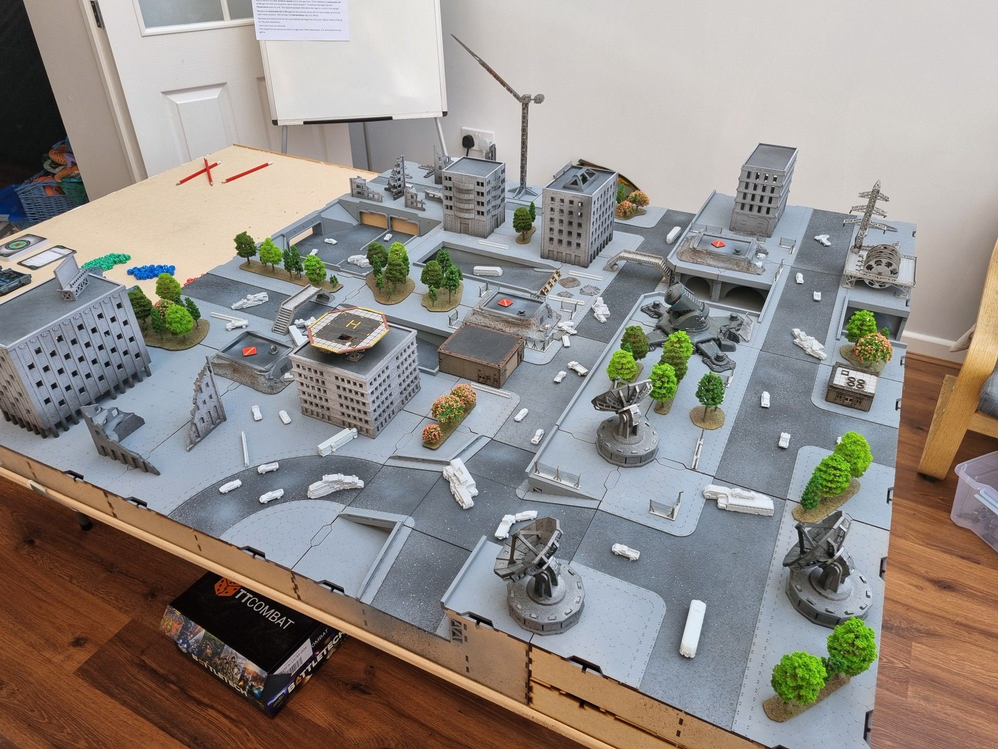 A 4 foot square city table with 1:160 terrain set up for a game of Dropzone Commander