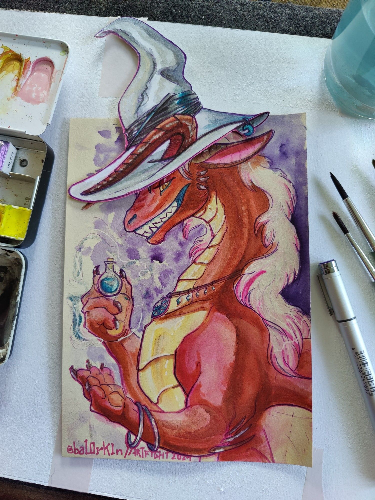 A watercolor painting showing a feral red dragon, waist-up, ordained with perlescent blue jewelry and an impressive, white, witch hat, presenting a potion to the audience. The option vial looks very small in her massive paws. She is wearing an inviting smile on her face, baring sharp teeth.