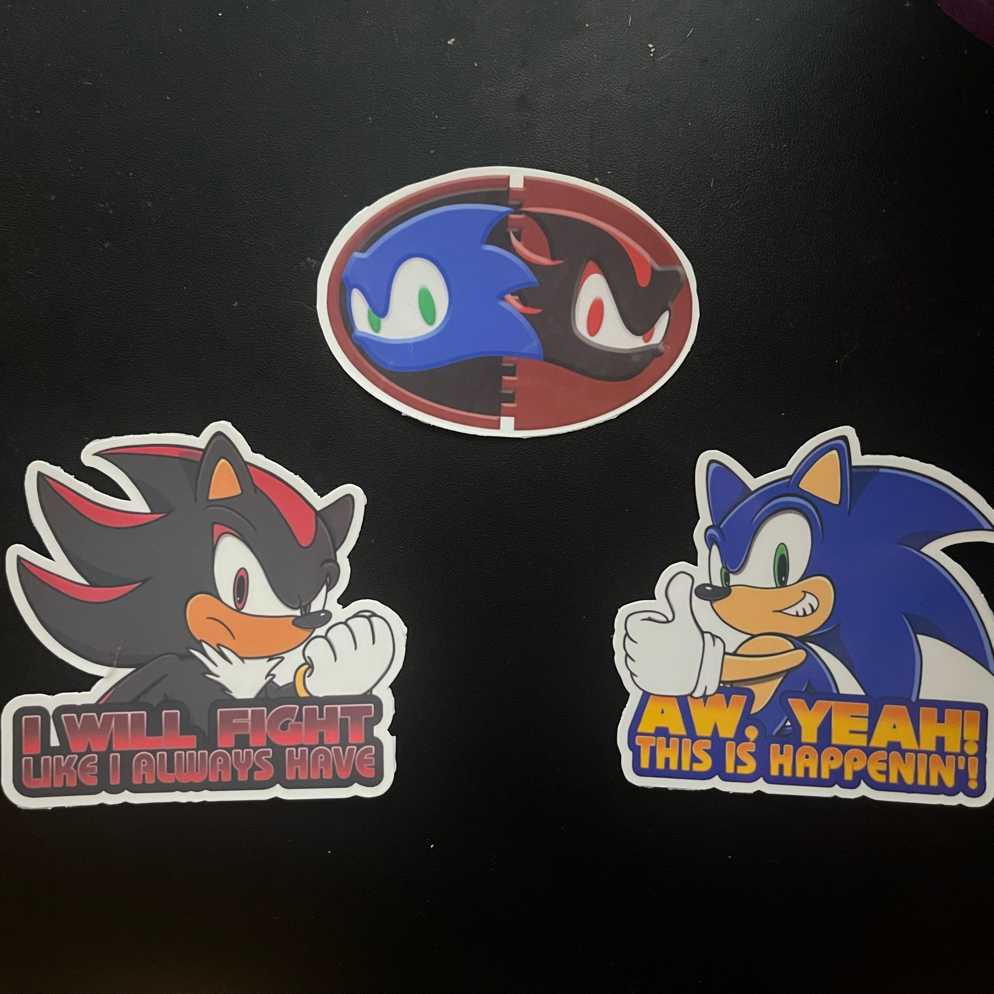 Picture of actual sticker prints of the designs detailed in the previous photo.