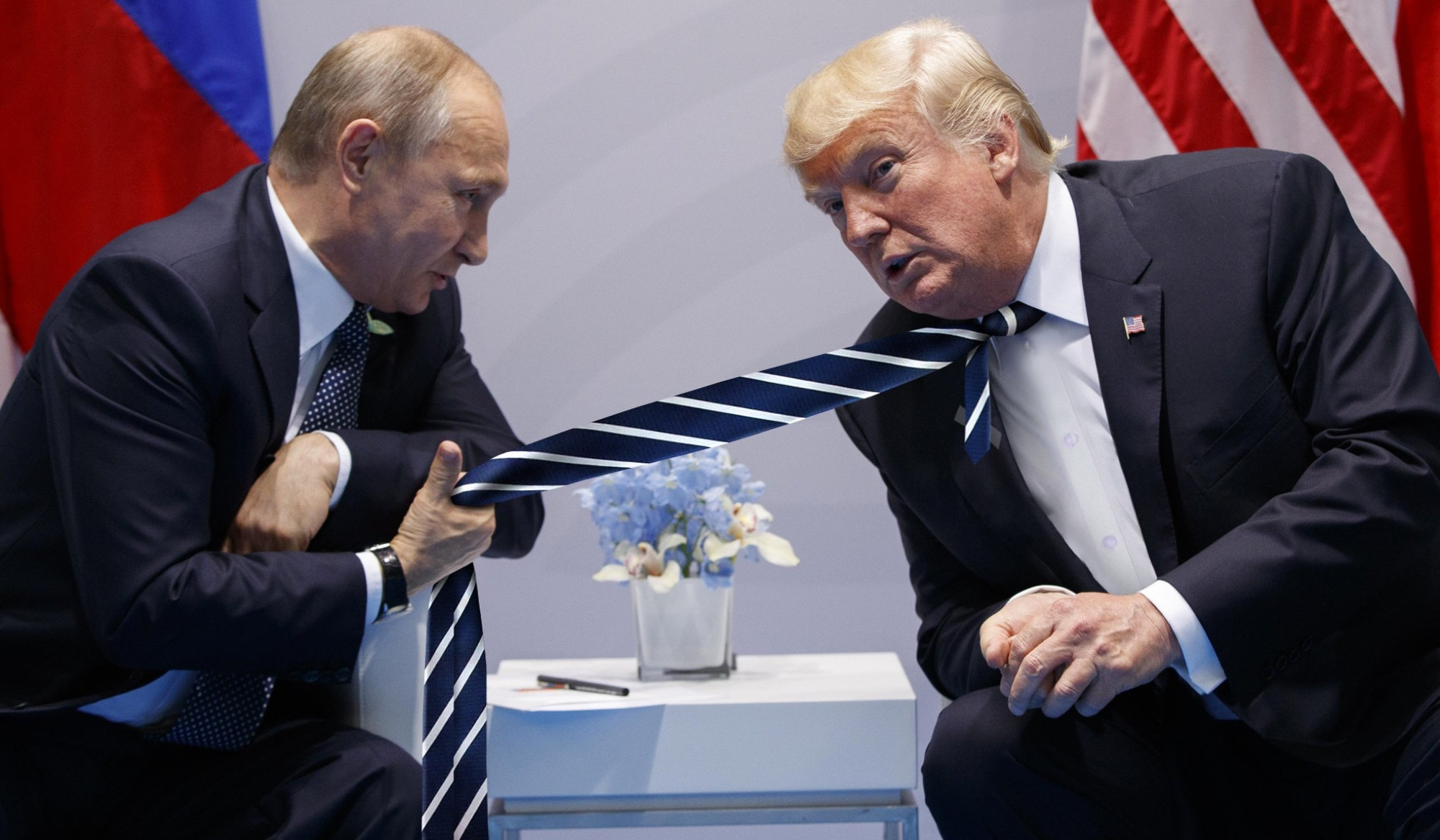 Putin pulling Trumps dumb-ass tie.