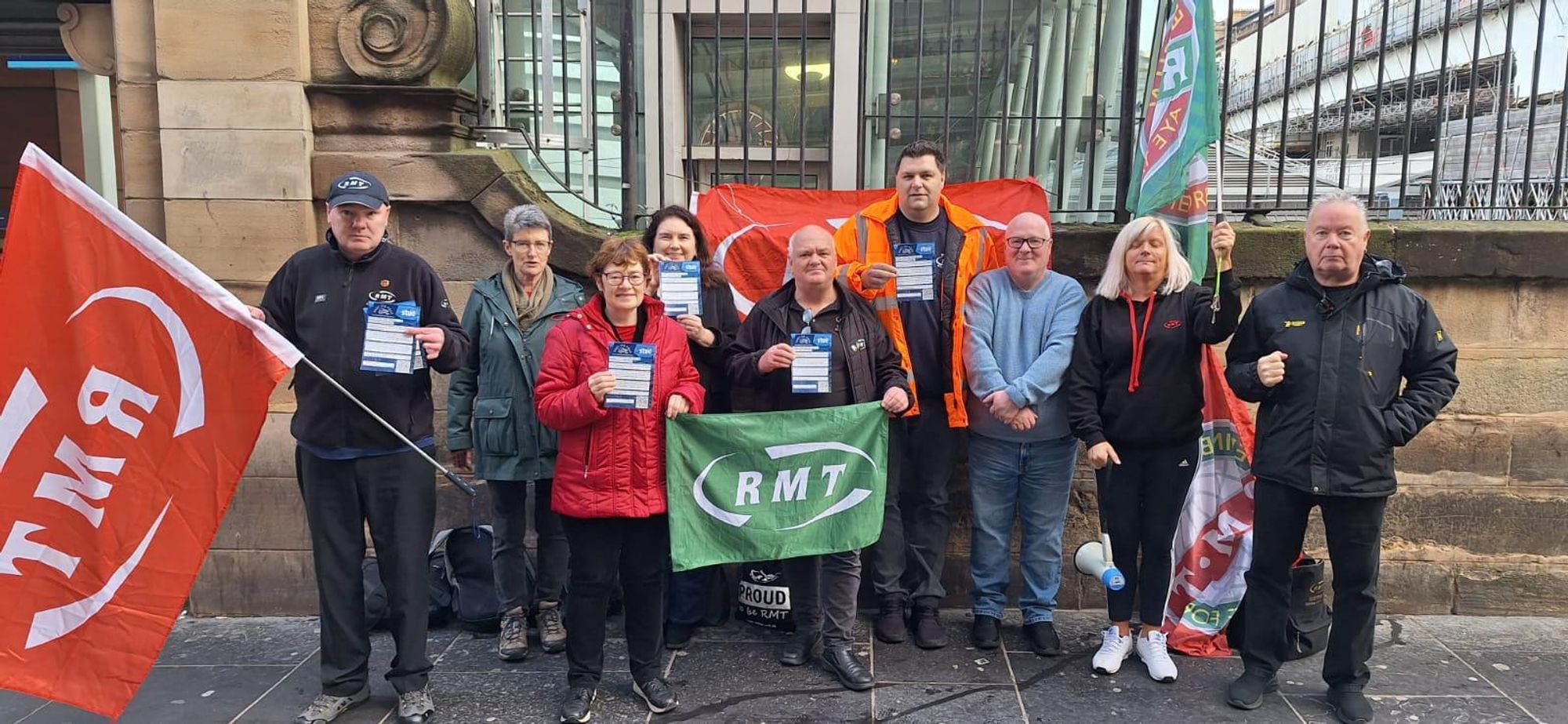 RMT members and supporters outside Edinburgh Waverley station today calling for an end to peak fares