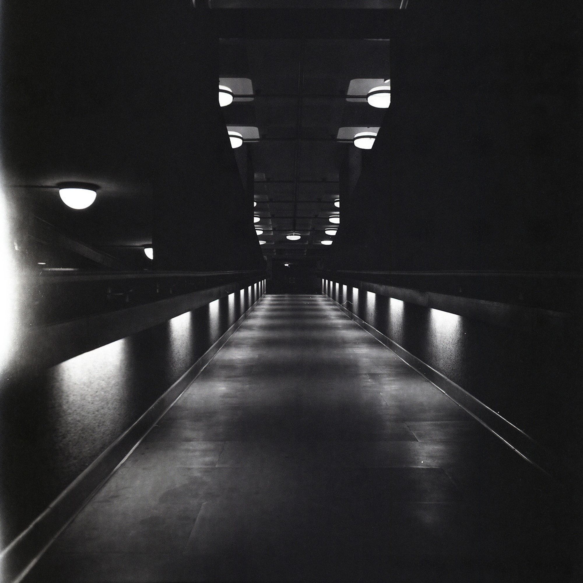 a dark moody ramp in the Barbican in London. Looks like a cover for a EP of John Peel sessions in about 1982