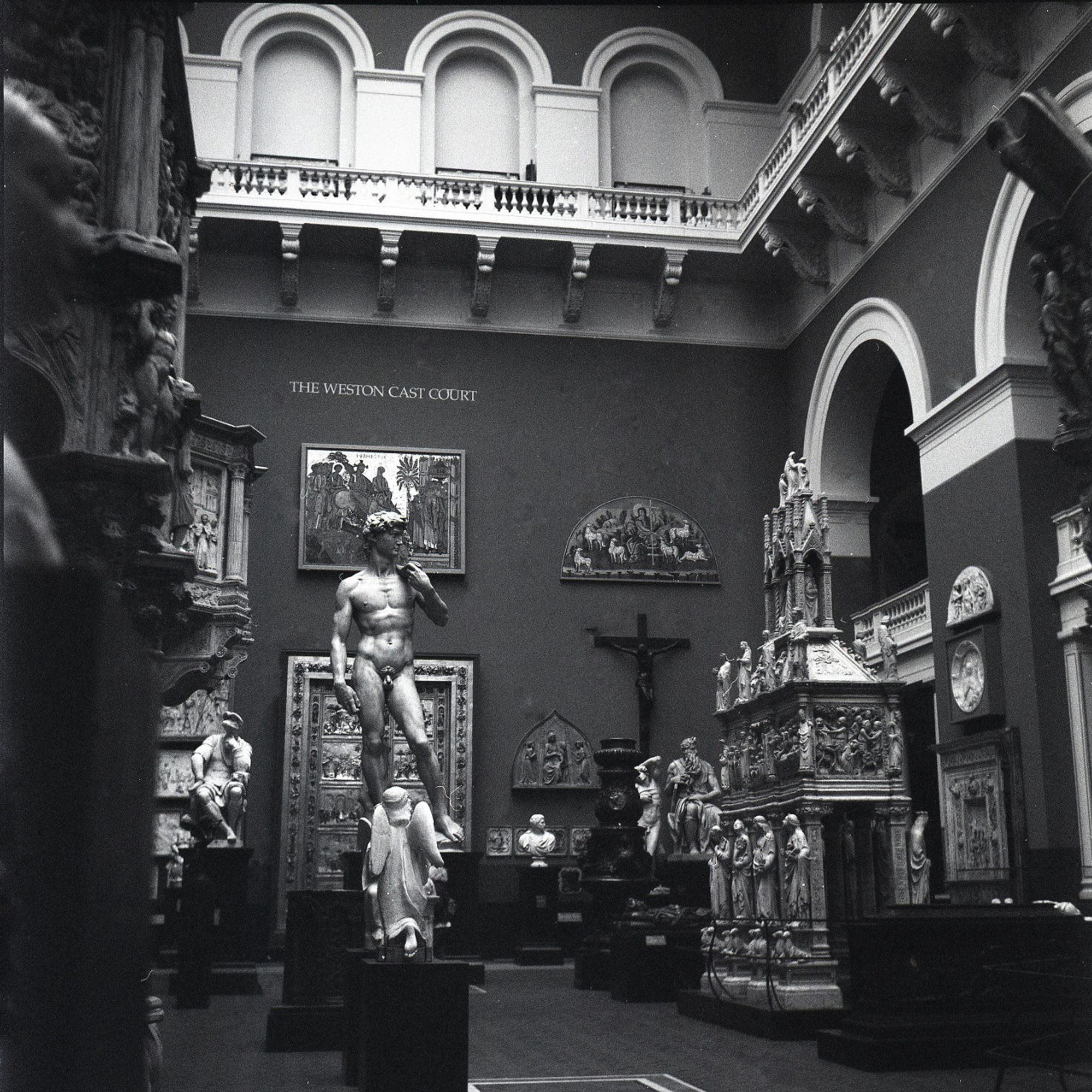 View of a gallery full of statues but empty of people at the V&A