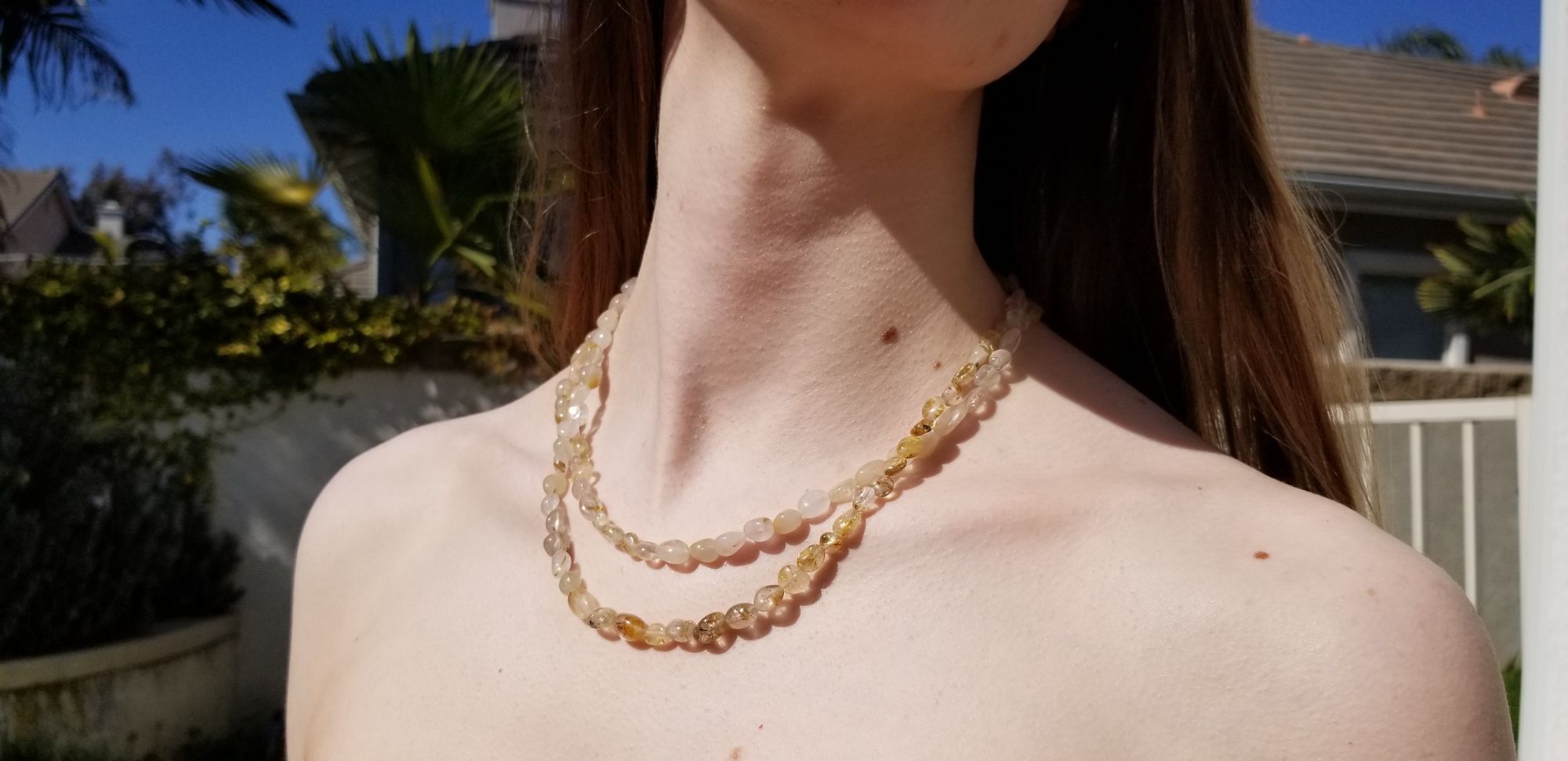 Double strand necklace of irregular Rutilated quartz. It's actually a single long strand doubled up.