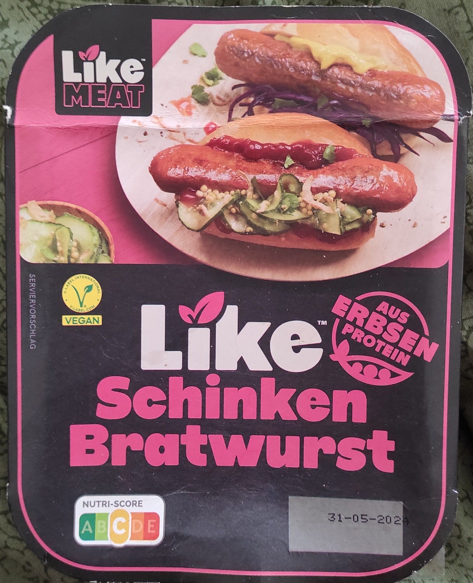 Packung vegane Schinkenbratwurst aus Erbsenprotein von Like.