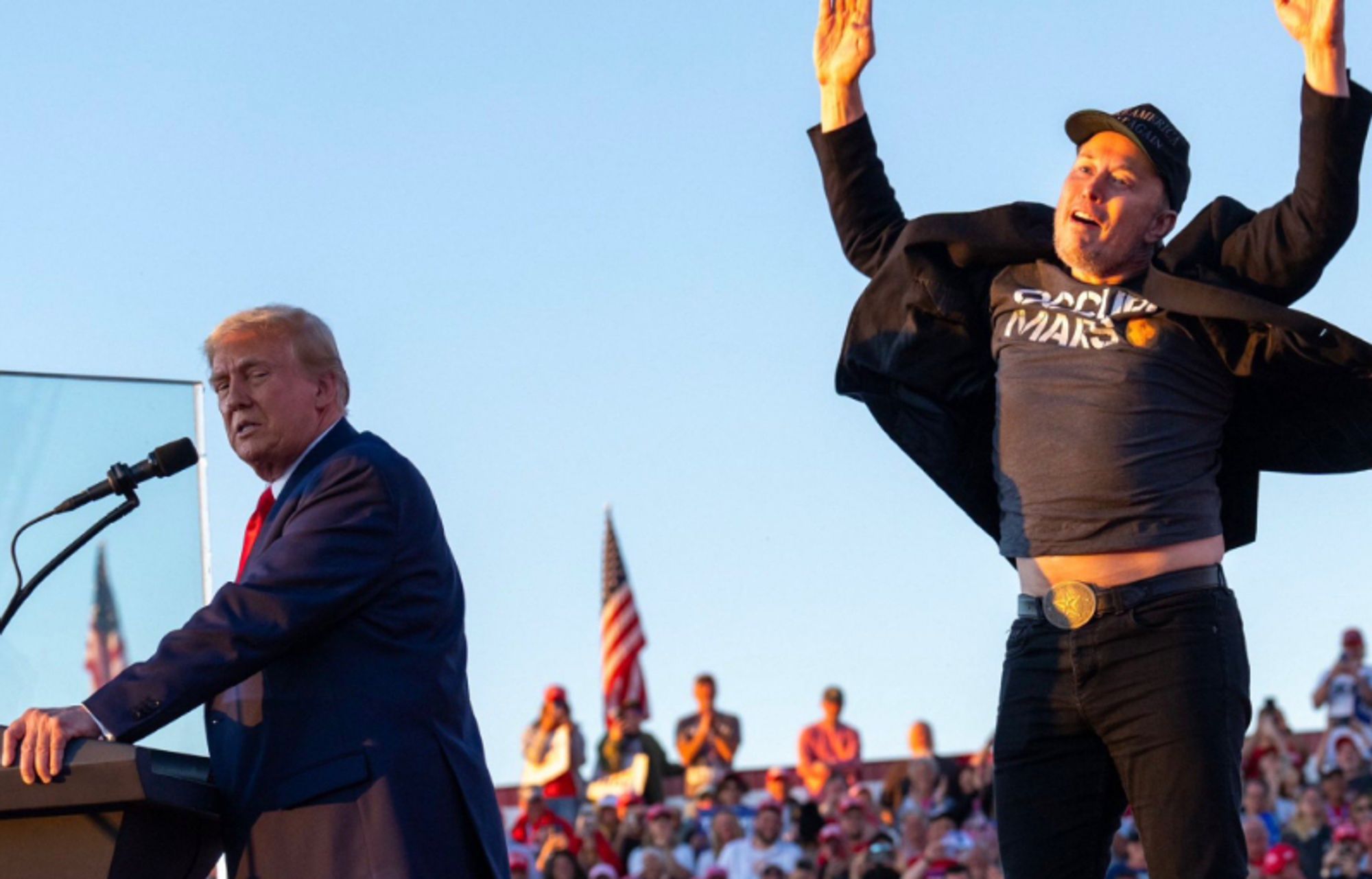 Trump looking back like 'wtf' at Elon Musk jumping for the camera