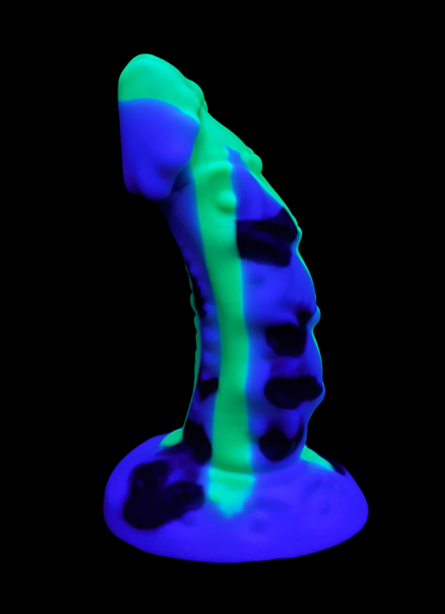 UV of white dong with black spots and a neon green drip (left side)