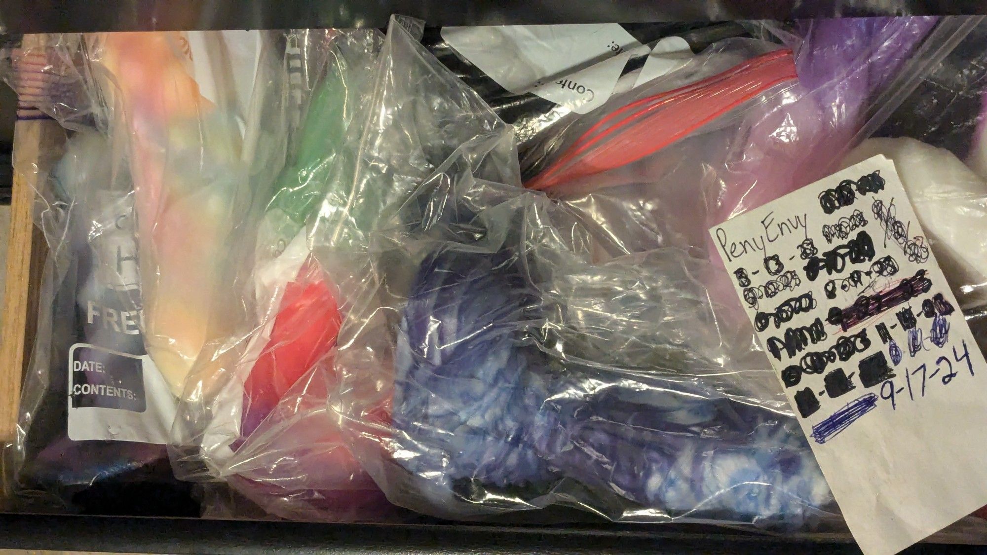 A timestamp with several bagged silicone toys for sale