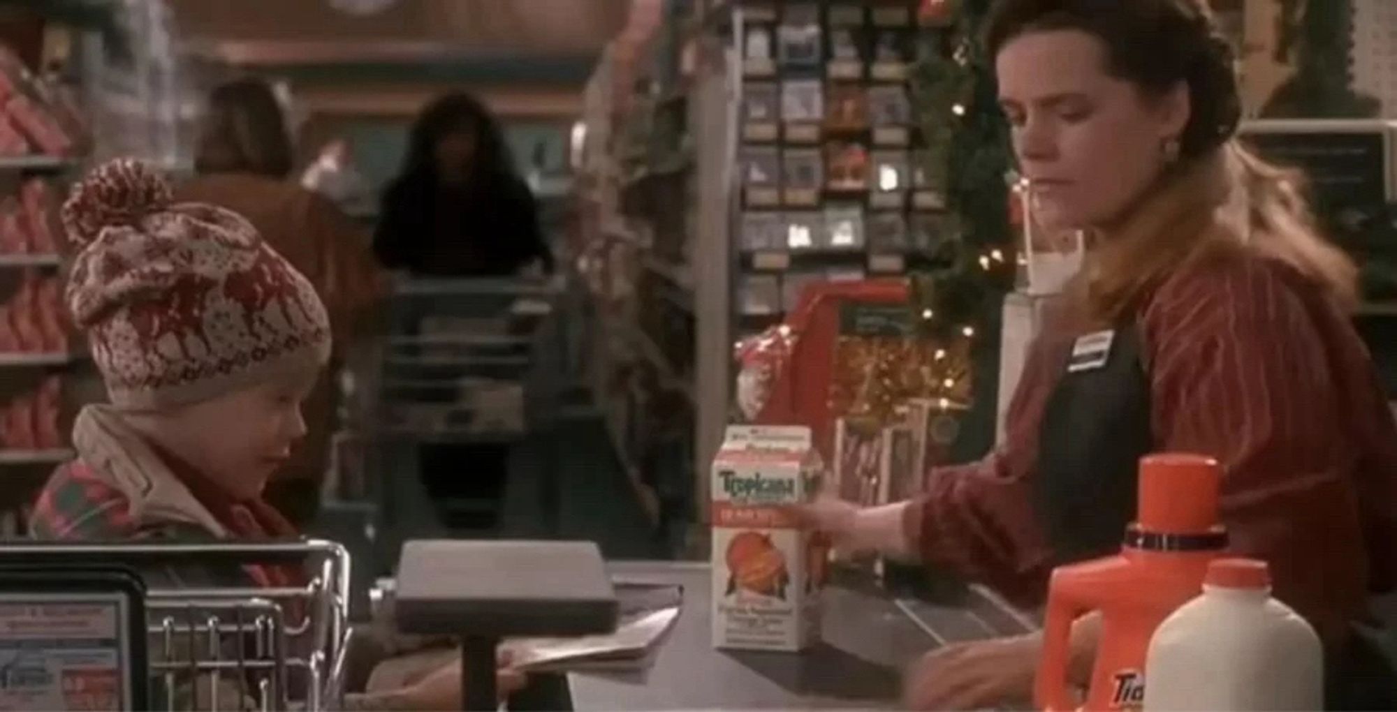 Kevin McCallister in Home Alone (1990) buying groceries at the supermarket.