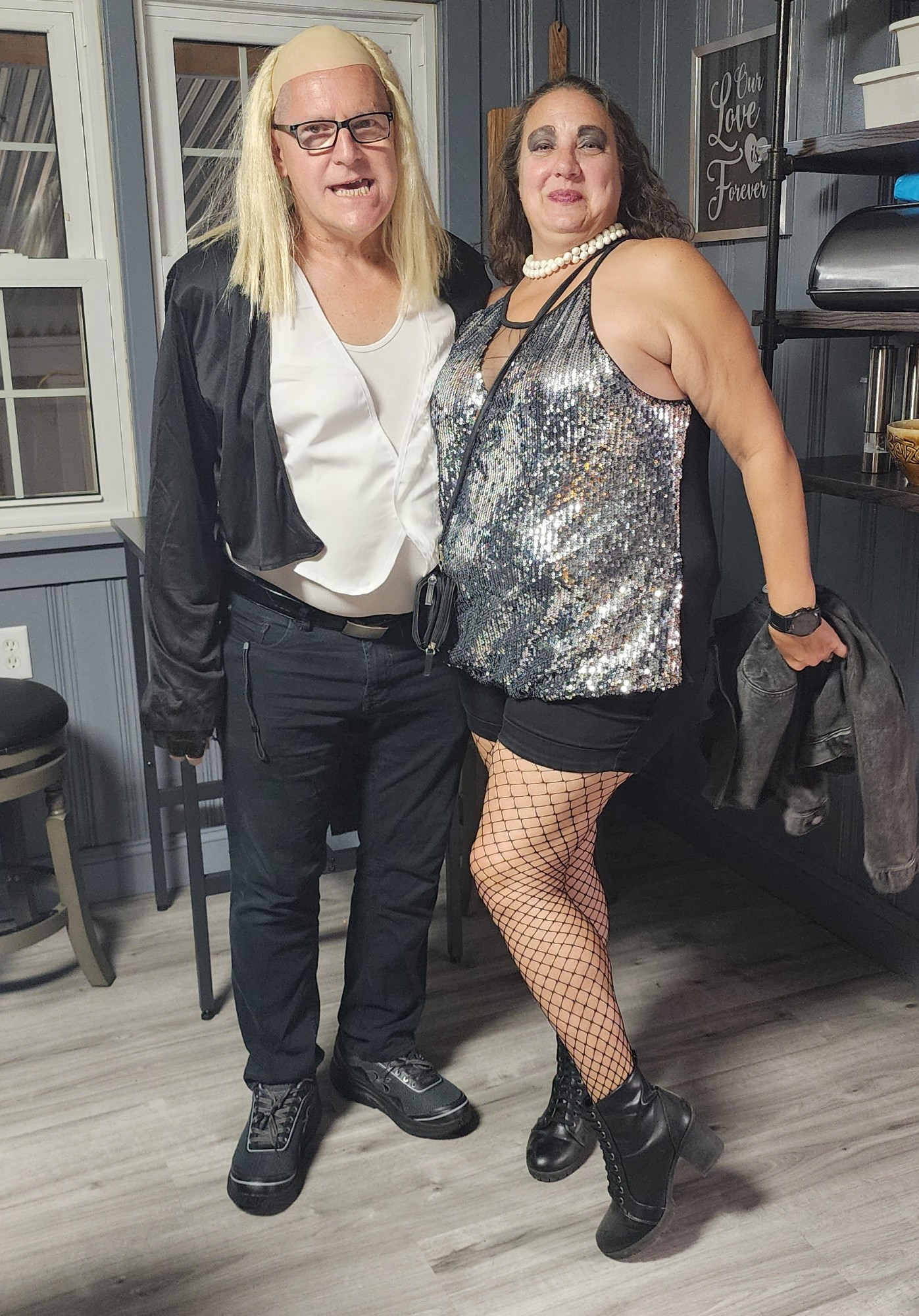 an image of my mother and her husband dressed up as Dr. Frank N. Furter and Riff Raff from Rocky Horror Picture Show.