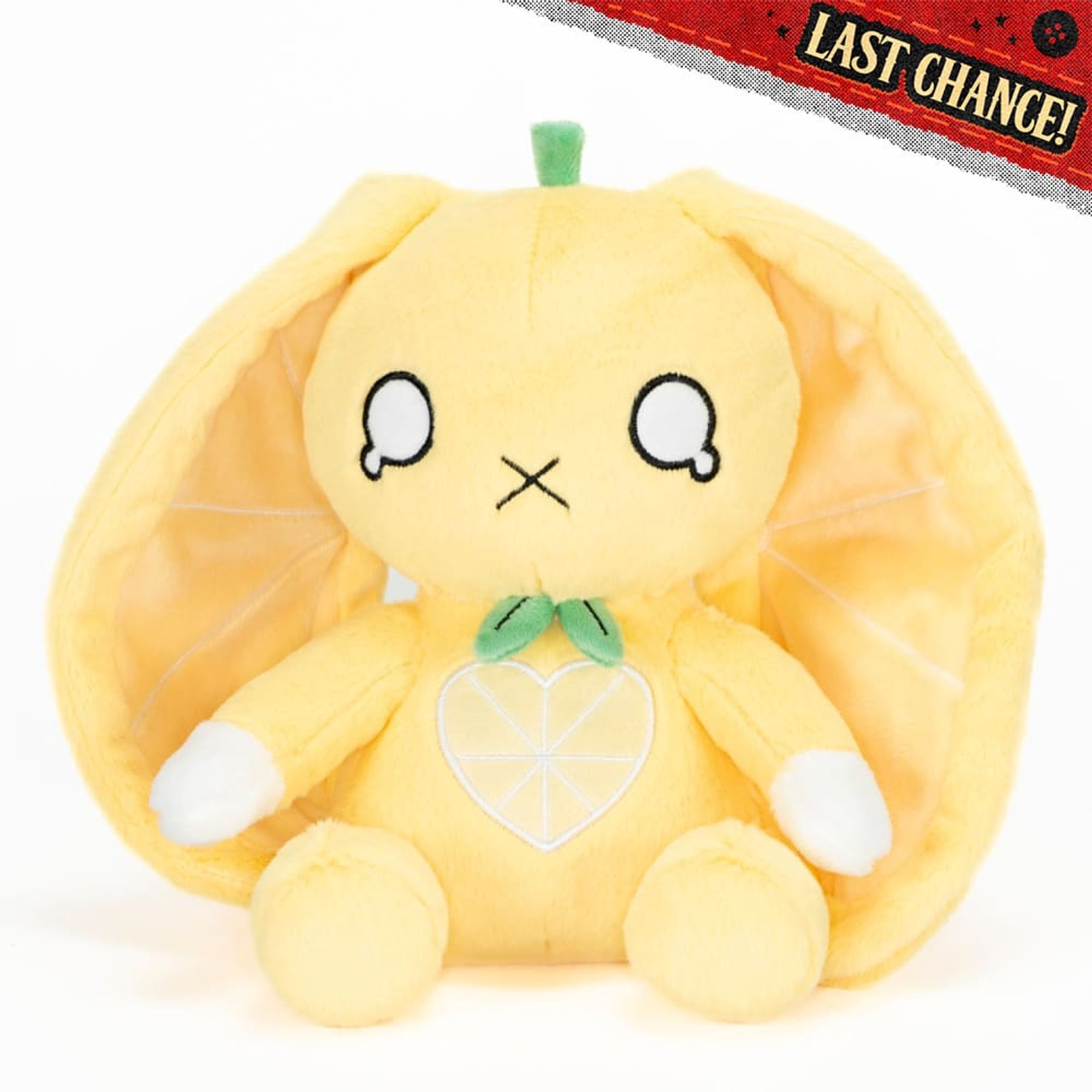 lemon bunny!! it has big droopy lemon slice ears and a little stem and it looks like it just ate something sour... like with tears on its eyes and a little x mouth