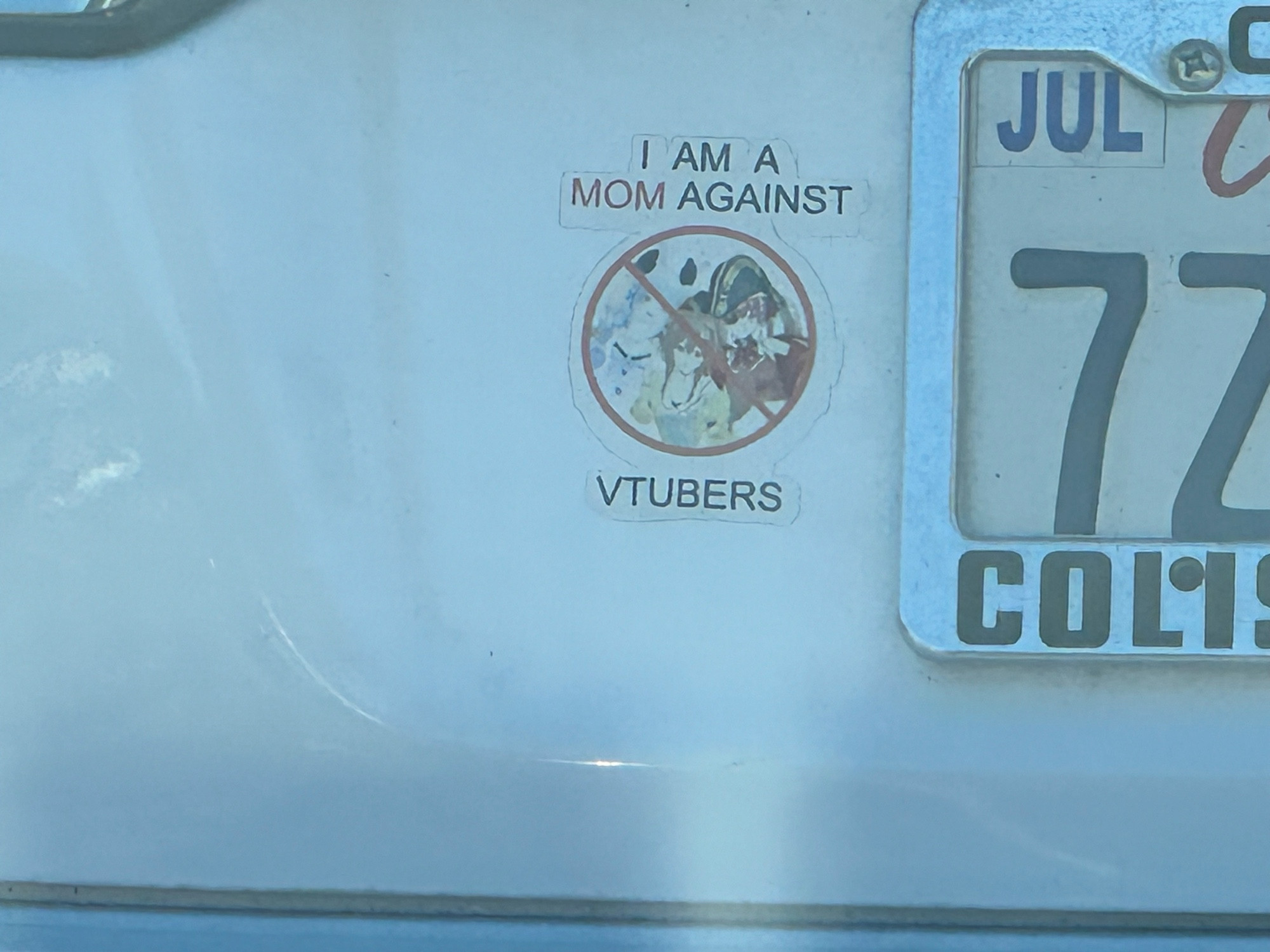 a bumper sticker that says "i am a mom against vtubers"