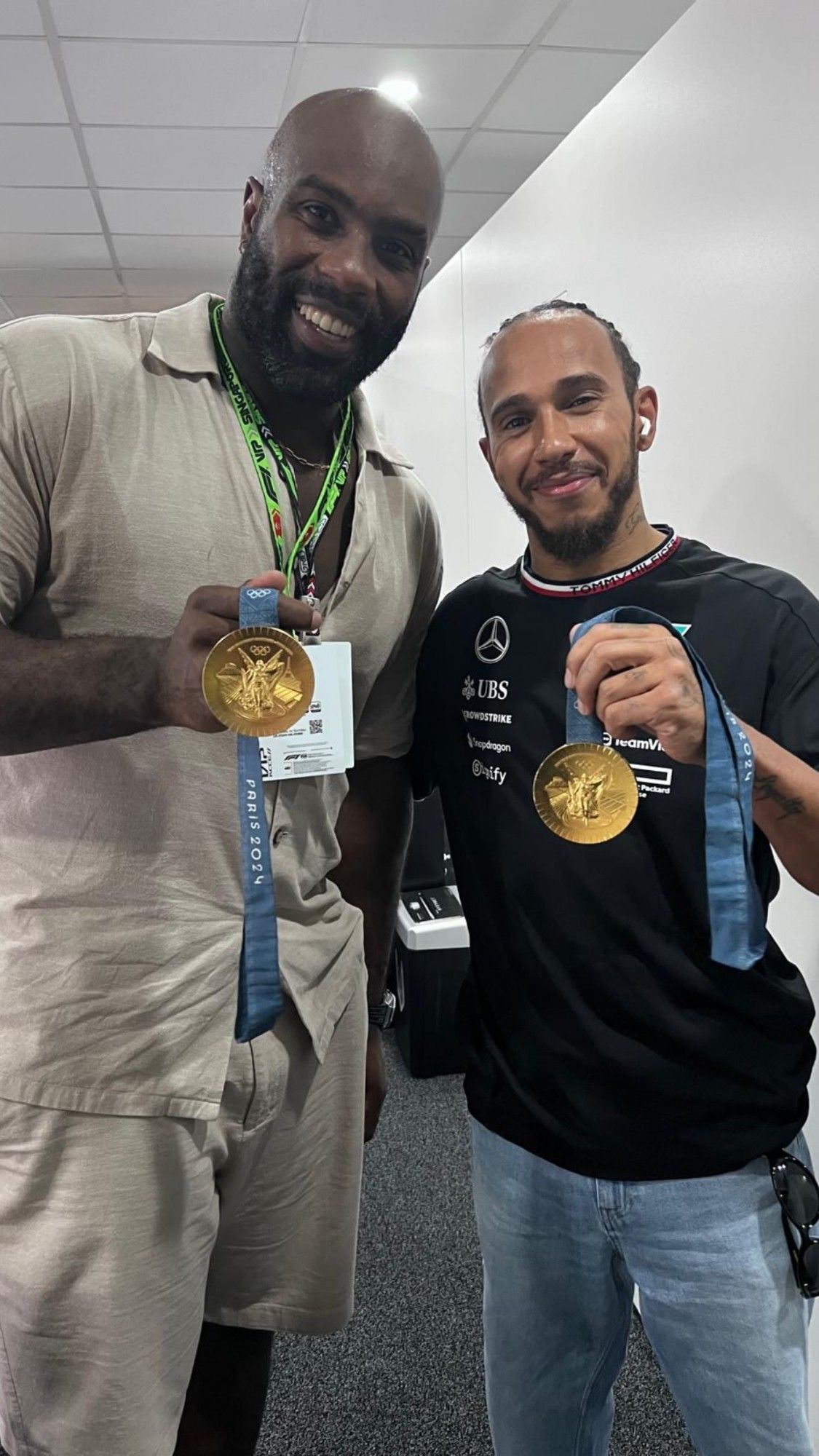 A photo of Lewis Hamilton and French judoka Teddy Rinner at the Singapore Grand Prix.

Photo caption: "OMG, LEGENDS 🙌!! Lewis and French judoka Teddy Rinner...he brought his Olympics gold medals to take a pic with Lewis 🥹🥇"

#SingaporeGP #ParisOlympics2024