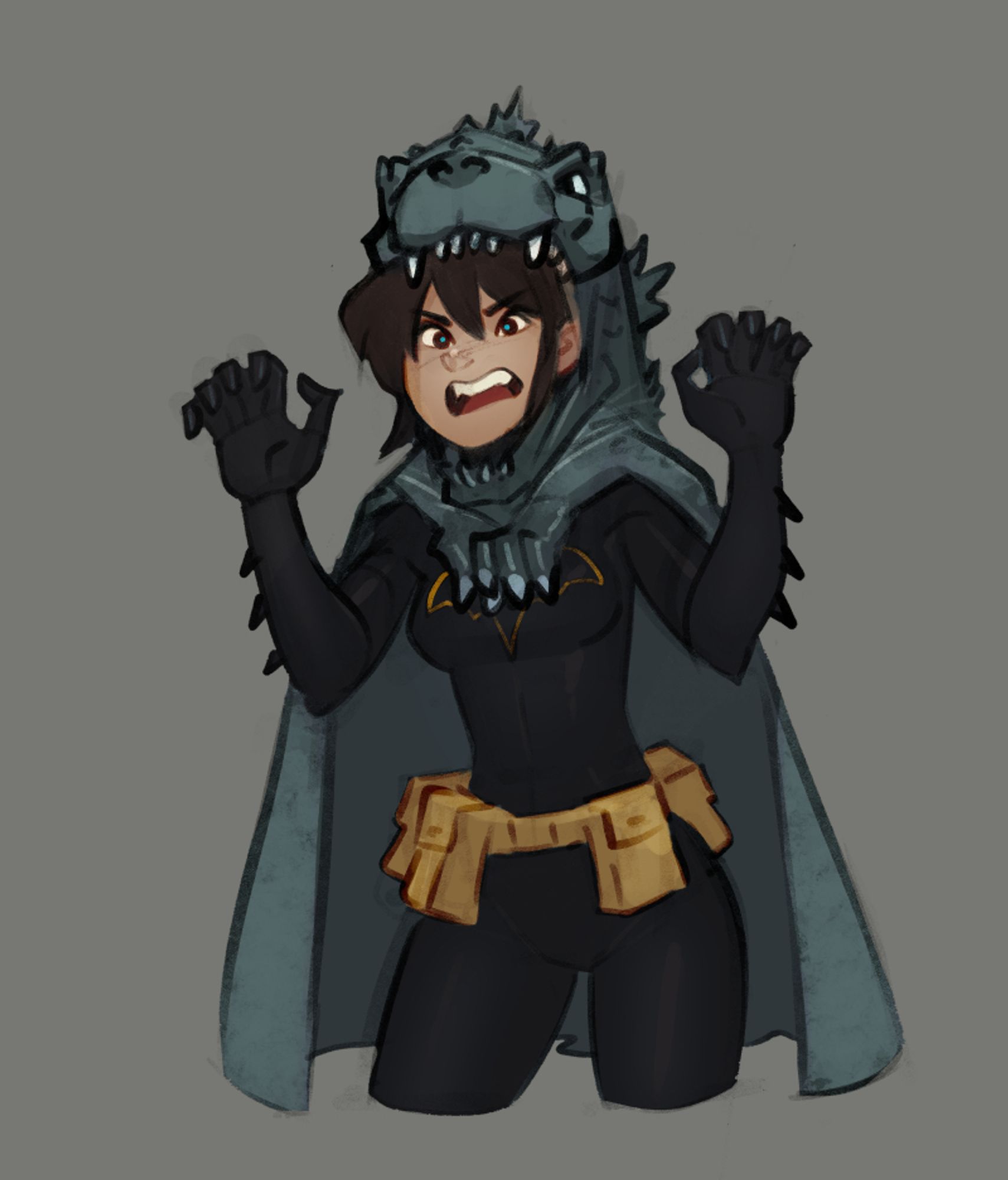 Cassandra Cain wearing a Godzilla cape.