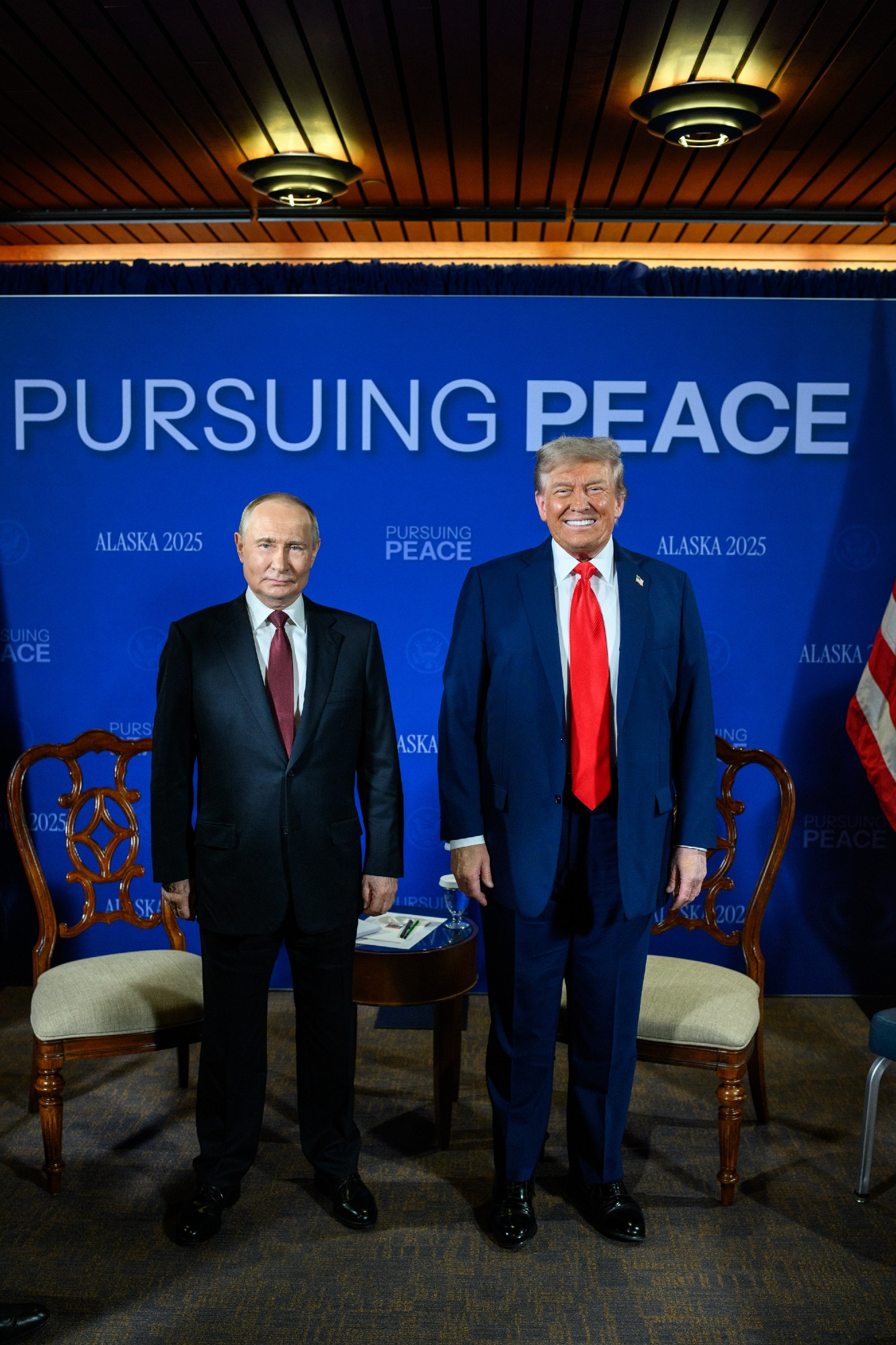 Photo of Putin and Trump n Alaska, August 2025, in front of a banner reading "Pursuing Peace." Source: White House Twitter account https://x.com/WhiteHouse/status/1956446335261175865 