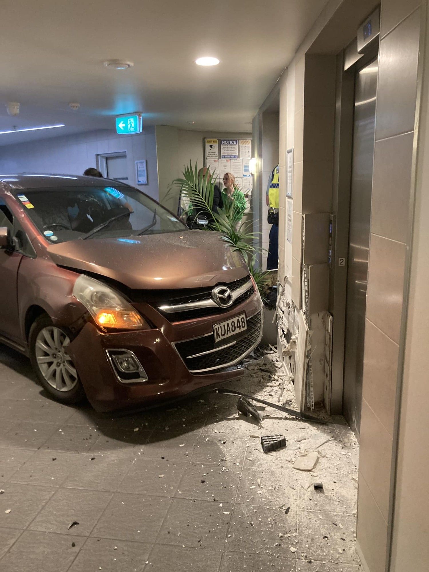 car crashed in apartment lobby