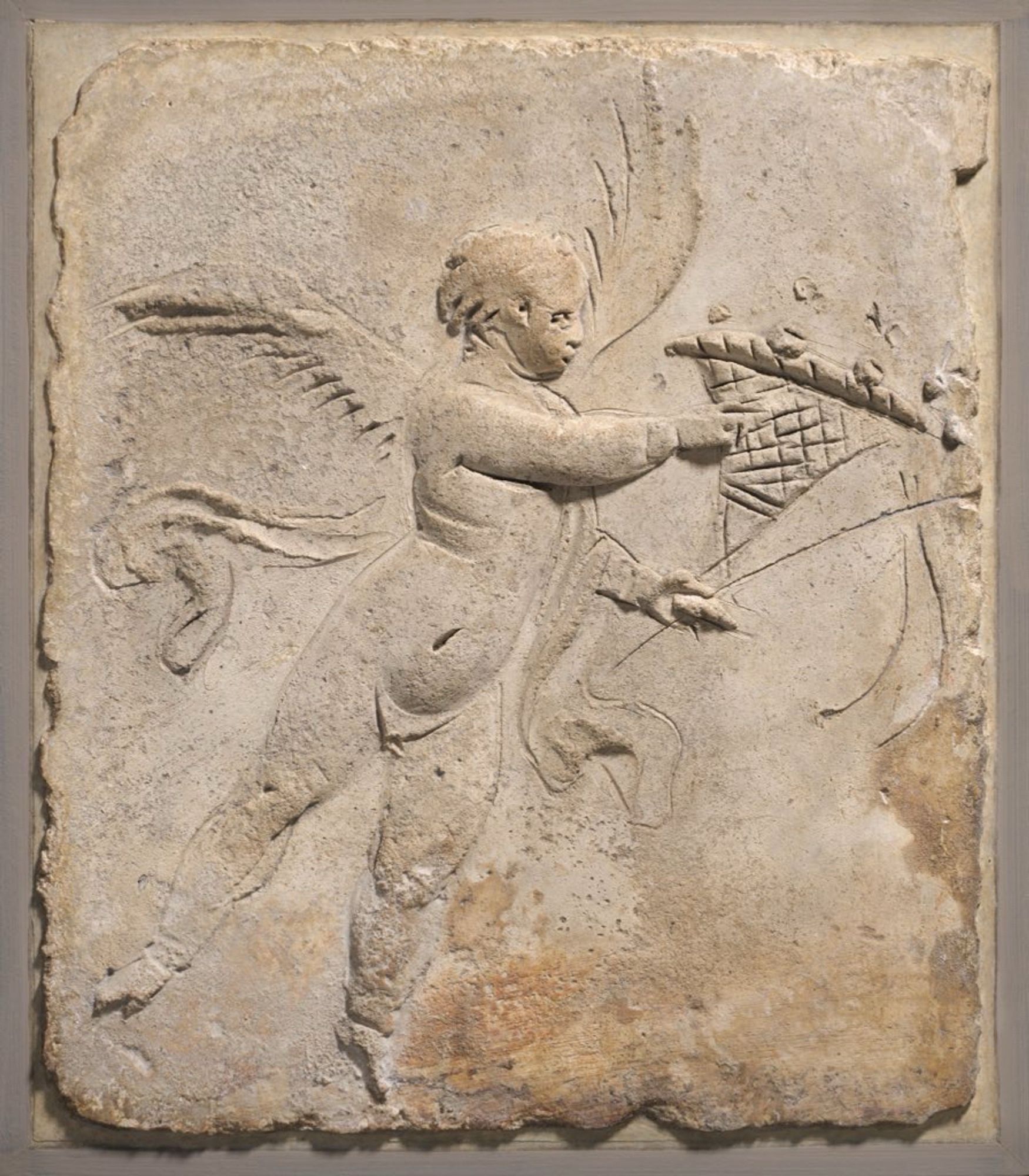 Description from The Met: “Eros holds a large cornucopia and a thin wand-like stick. His wings are delineated with extraordinary economy and verve.”