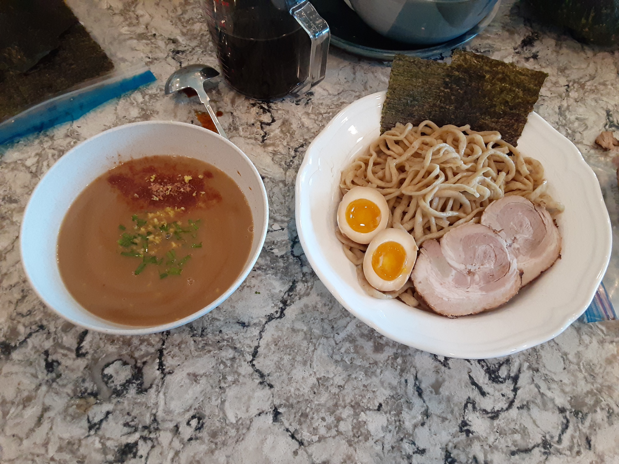 homemade tsukemen (ramen where the ingredients are presented cold and dipped in a separate broth) the noodles are hand-cut, and topped with chashu, ramen eggs and sheets of seaweed, and the broth is a thick tonkotsu (pork bone) broth