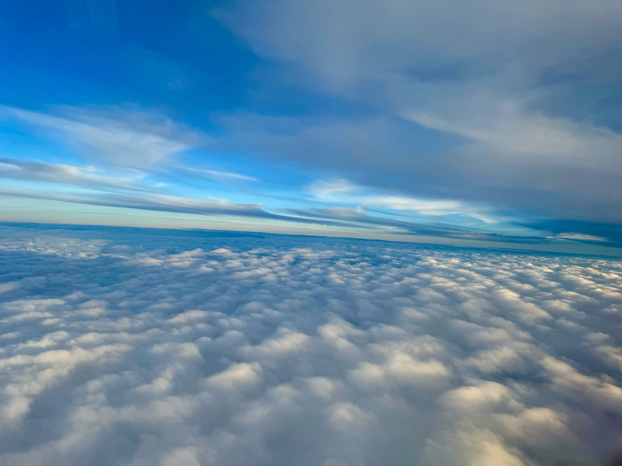 Blue skies above the clouds