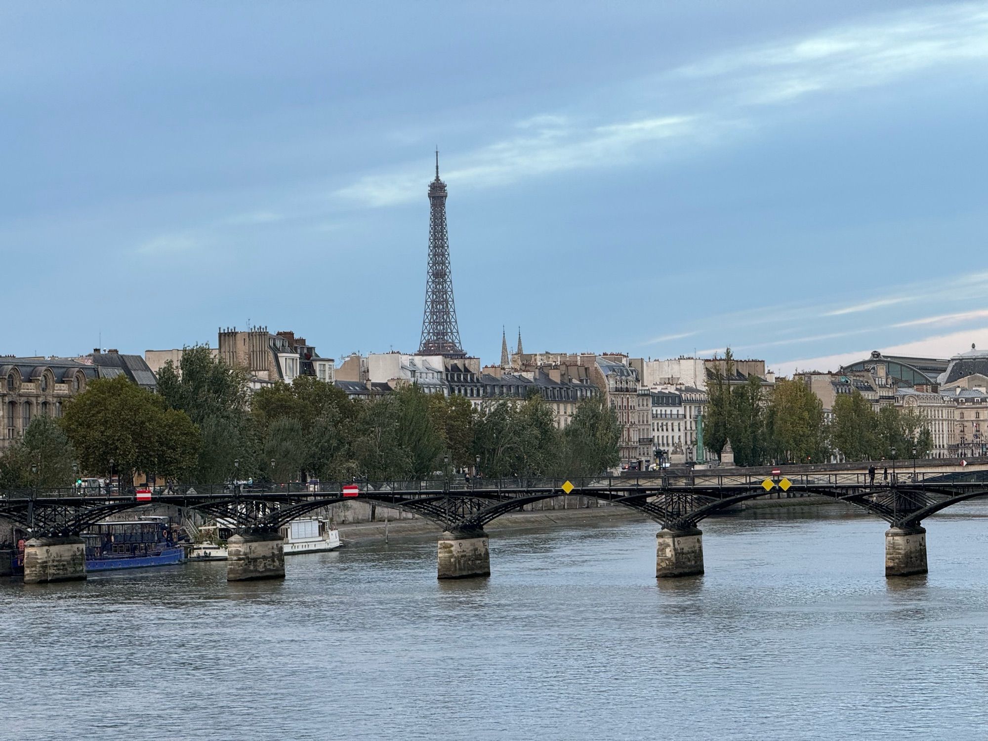 A view from the Pont Neufs of the Seine and early morning Eiffel Tower in Paris