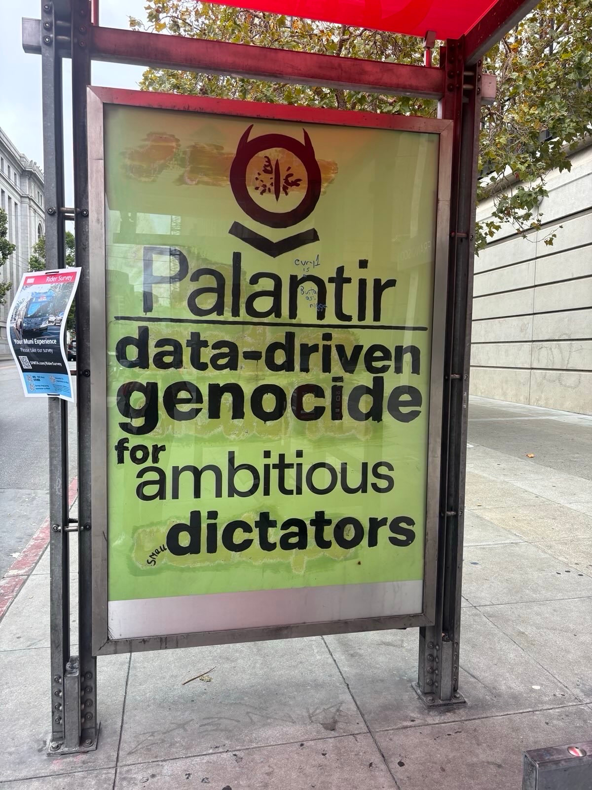 Bus shelter poster “Palantir data-driven genocide for ambitious dictators” 