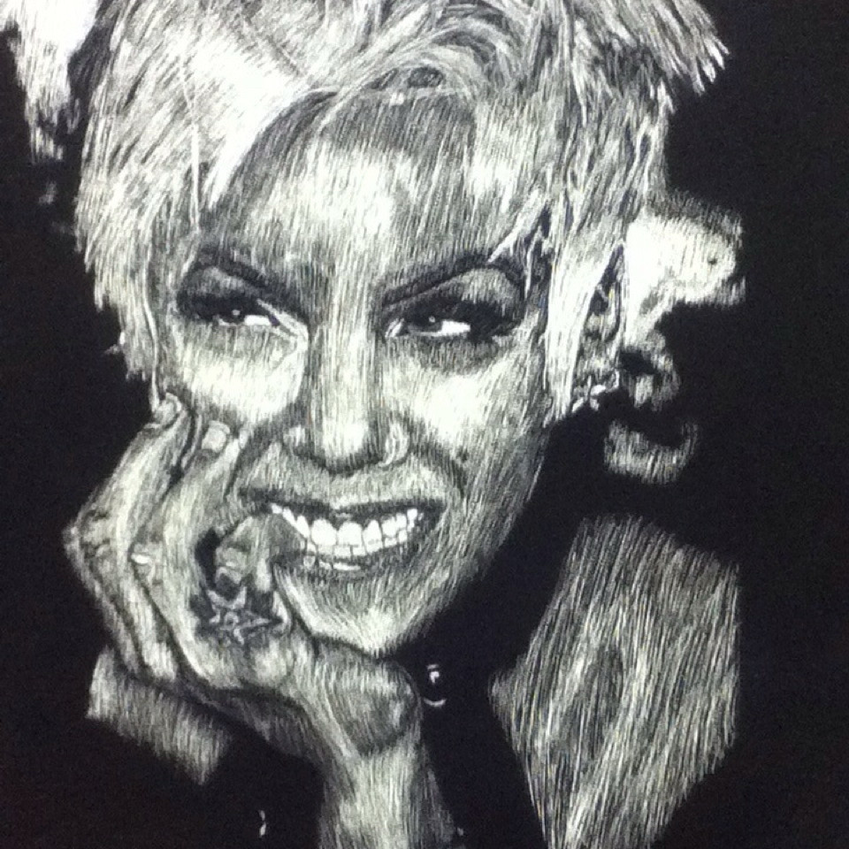 A scratchboard portrait of the singer Pink from the shoulders up