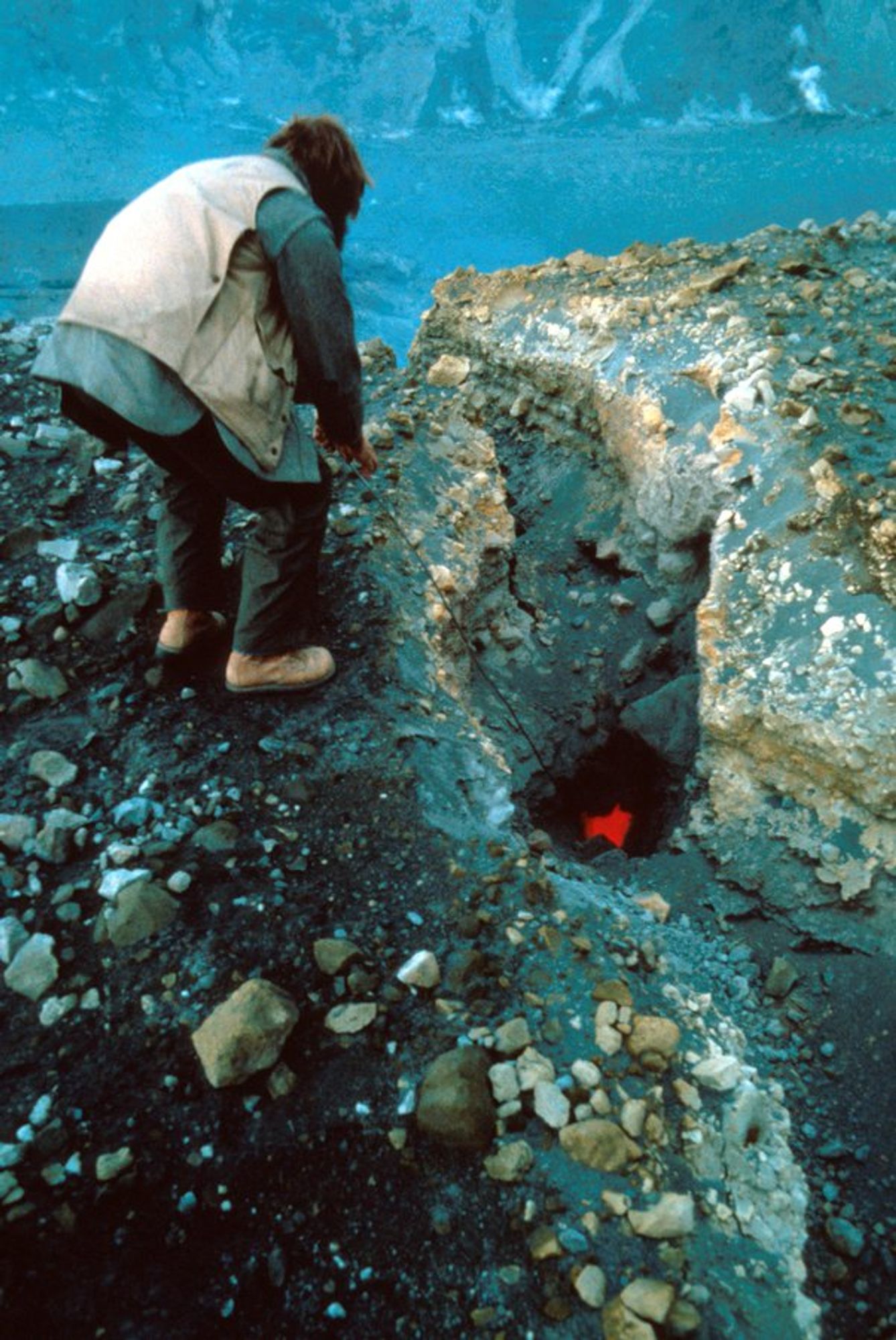 USGS scientist Rick Hoblitt measured the temperature of a radial crack in dome. September 25, 1980. Leighley/USGS