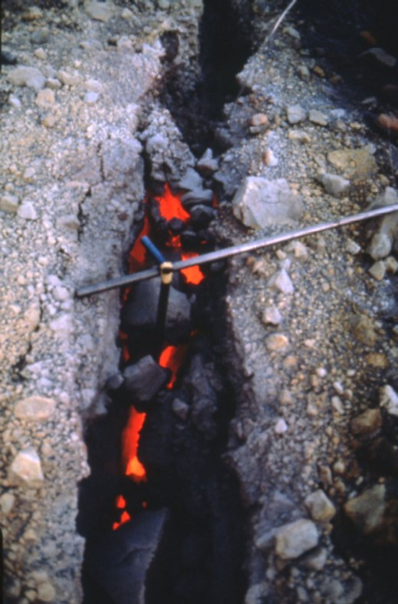 Gas sampling from radial crack in the dome of Mount St. Helens. September 25, 1980. Leighley/USGS.