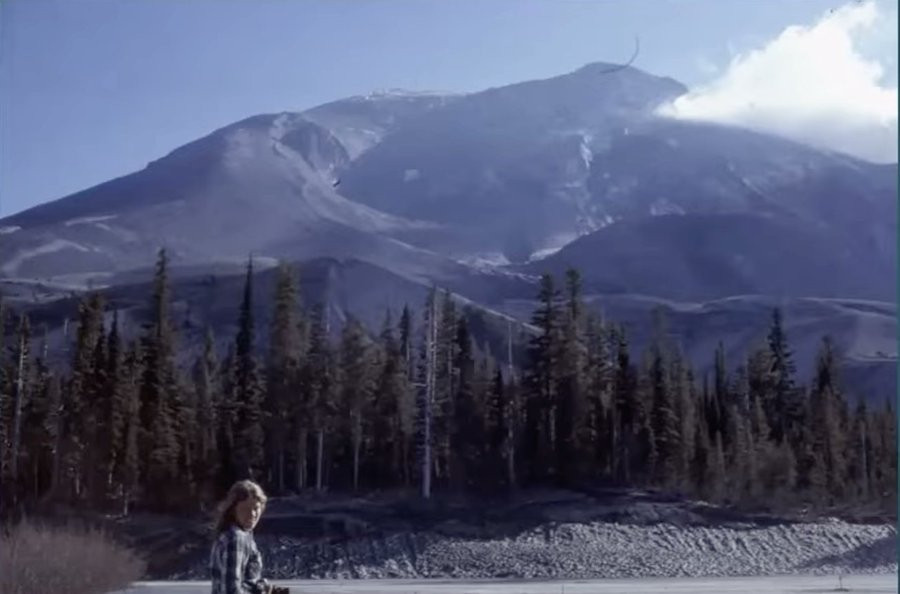 Mindy Brugman poses in front of Mount St. Helens at the Timberline parking lot. May 17, 1980. Source: Carolyn Driedger