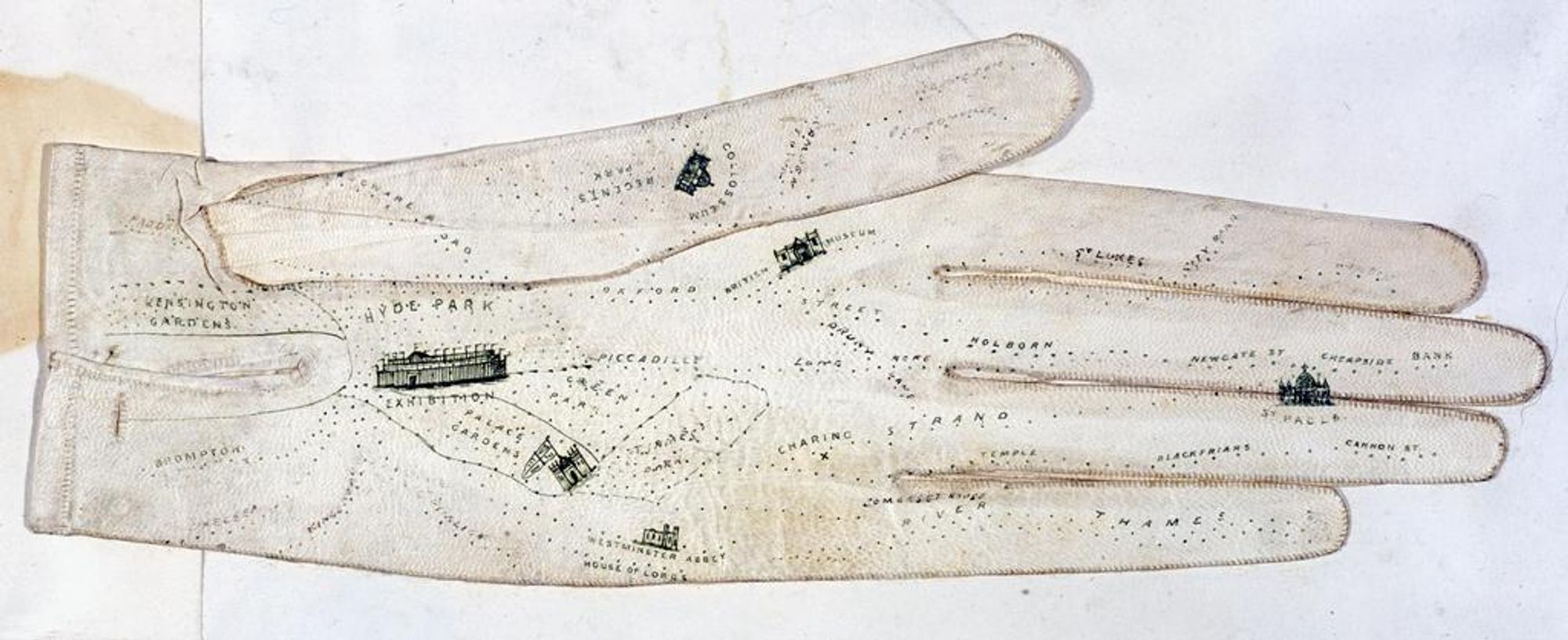 A white, leather ladies' glove from the Victorian era, hand-painted on the palm and fingers with London landmarks.