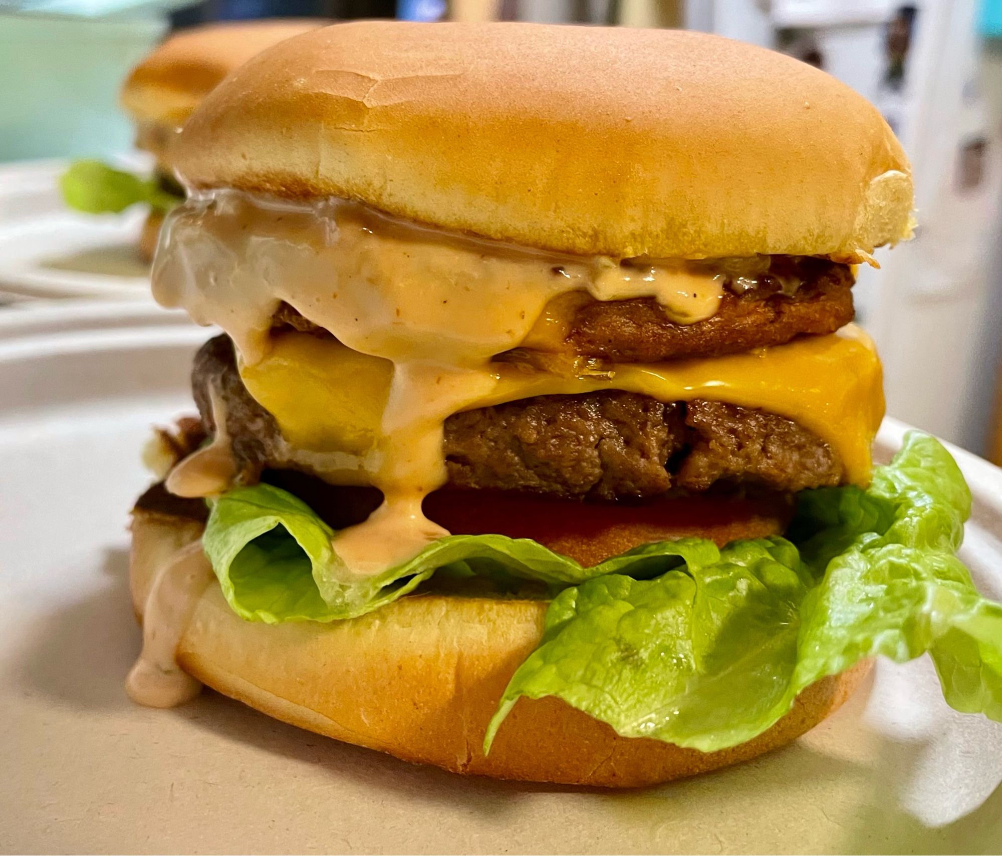 Vegan double cheeseburger with lettuce, tomato & special sauce